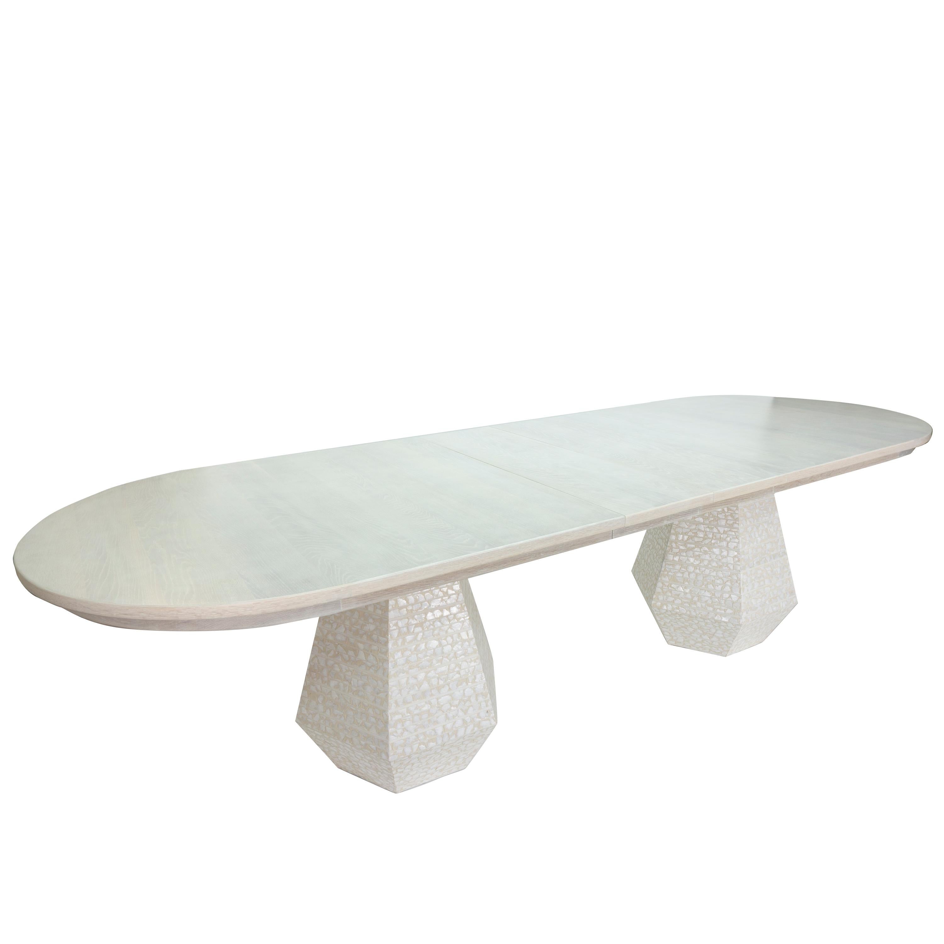 https://a.1stdibscdn.com/large-post-modern-dining-table-with-extension-leaves-for-sale-picture-3/f_21233/1553615857214/gabbiettaovaltable_angle2_master.jpg