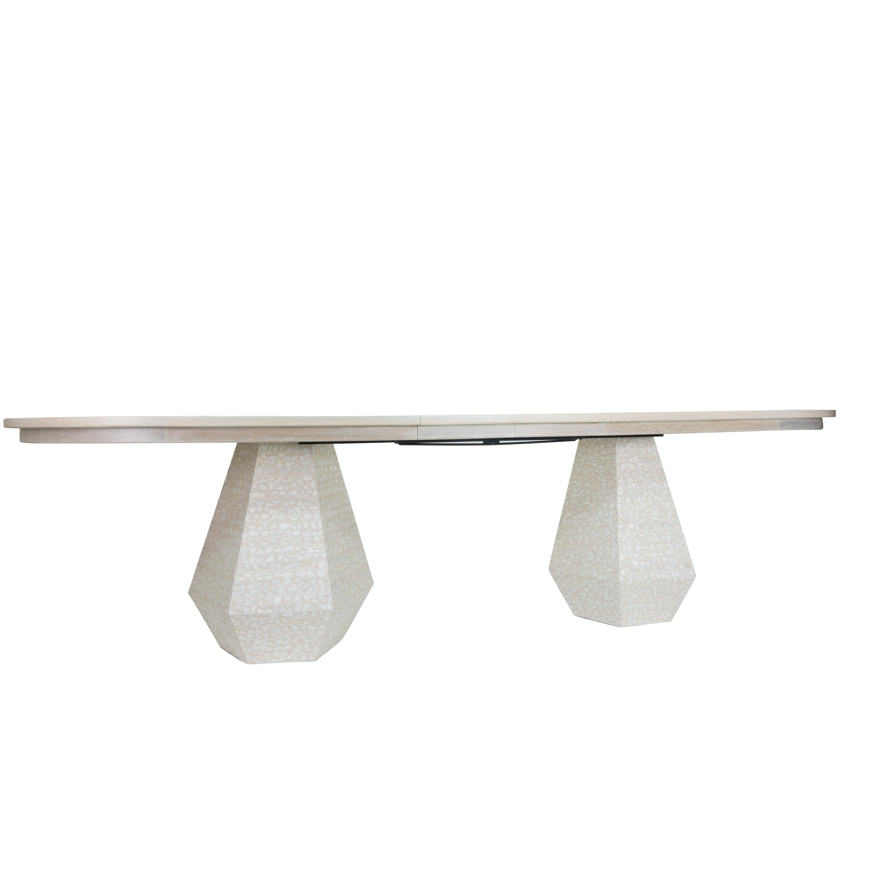 https://a.1stdibscdn.com/large-post-modern-dining-table-with-extension-leaves-for-sale-picture-4/f_21233/1553615859978/gabbiettaovaltable_angle3_master.jpg