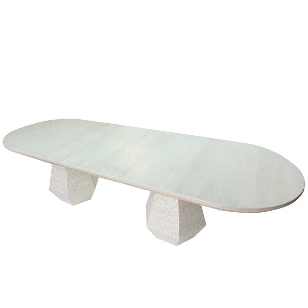https://a.1stdibscdn.com/large-post-modern-dining-table-with-extension-leaves-for-sale-picture-2/f_21233/1553615854347/gabbiettaovaltable_angle_master.jpg