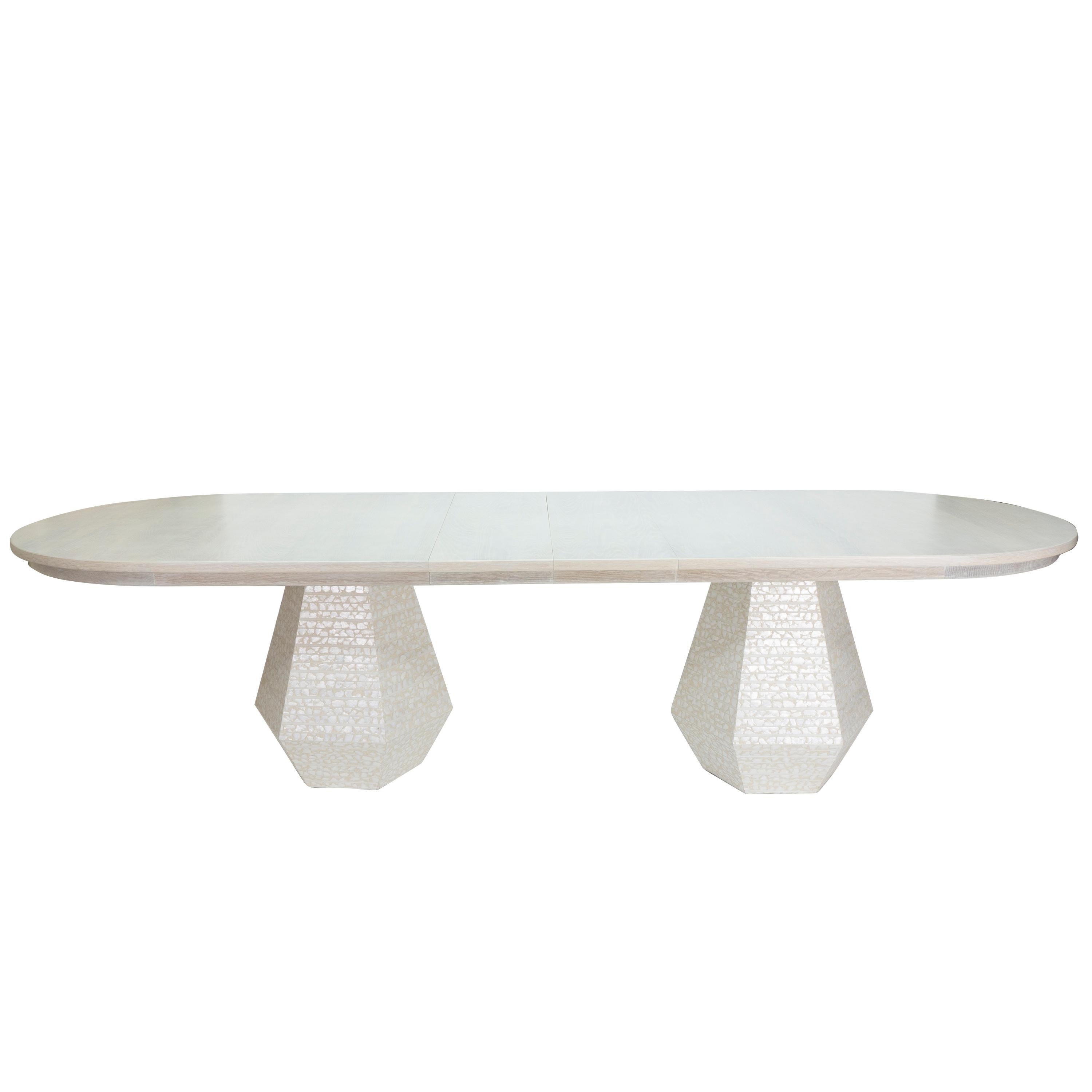 https://a.1stdibscdn.com/large-post-modern-dining-table-with-extension-leaves-for-sale-picture-6/f_21233/f_141546511553615951569/gabbiettaovaltable_front2_master.jpg