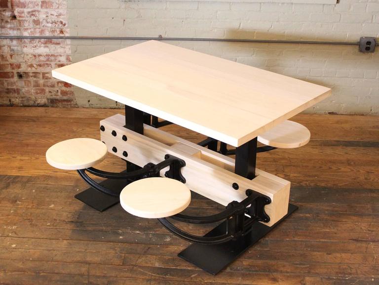 https://a.1stdibscdn.com/archivesE/upload/f_8299/f_65826631486397824651/getbackinc_swing_out_4seat_cafeteria_dining_kitchen_table_6_l.jpg