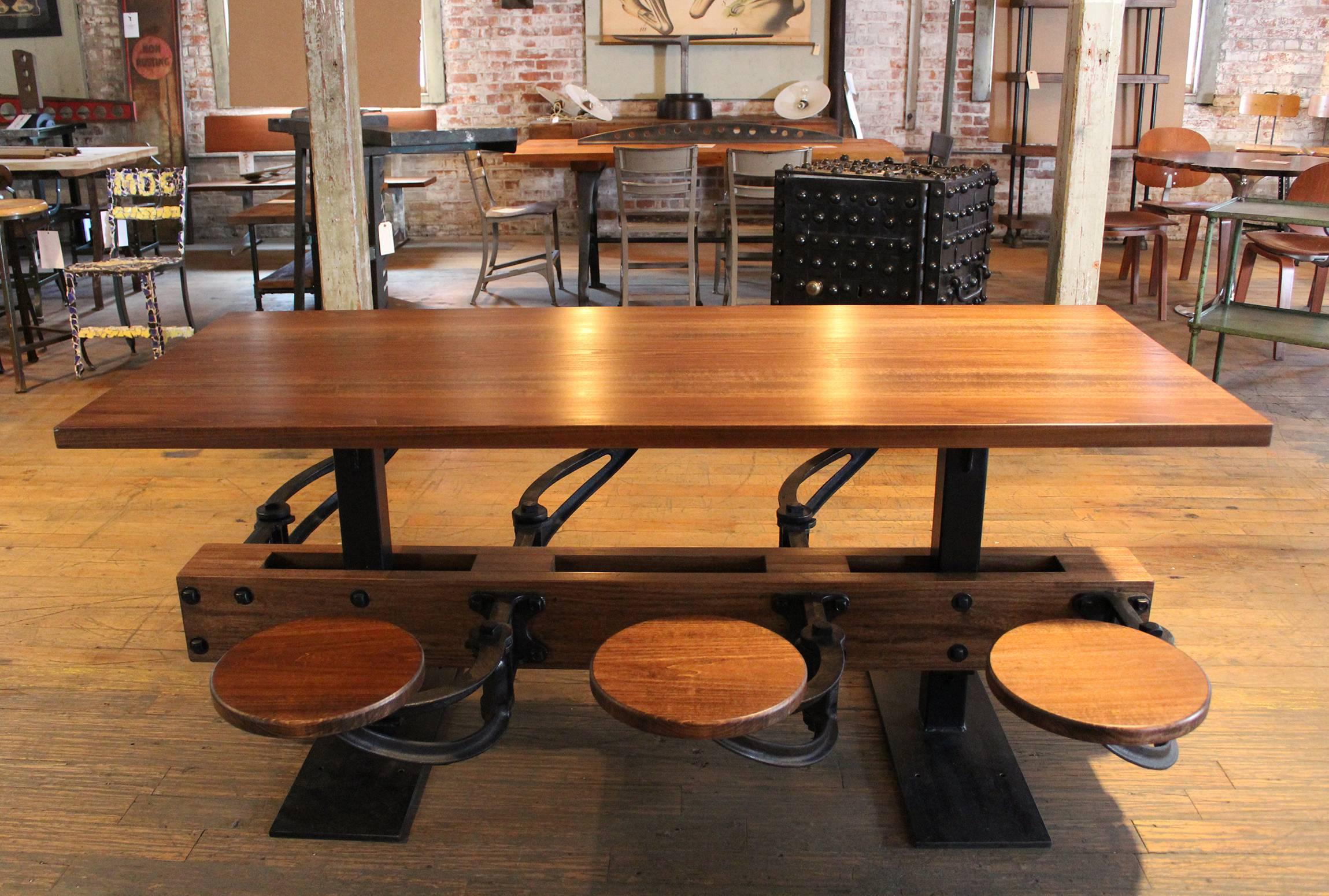 https://a.1stdibscdn.com/archivesE/upload/f_8299/f_61020131480709956924/getbackinc_swing_out_seat_table_6_seat_cast_iron_wood_1stdibs_8_master.jpg