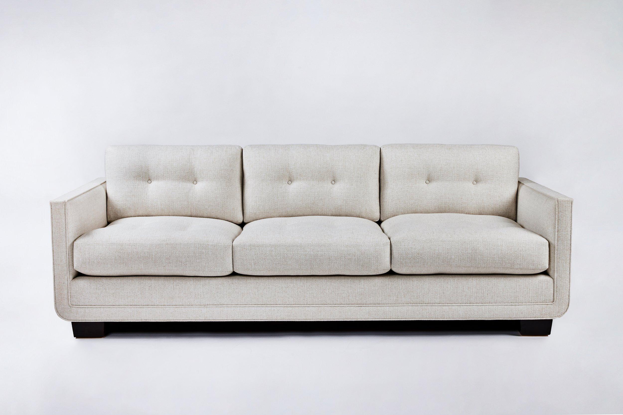 https://a.1stdibscdn.com/modern-streamline-tufted-sofa-with-curved-frame-detail-by-martin-brockett-for-sale-picture-2/f_50711/f_373666921701473610974/harrison_tufted_sofa_4_master.jpg