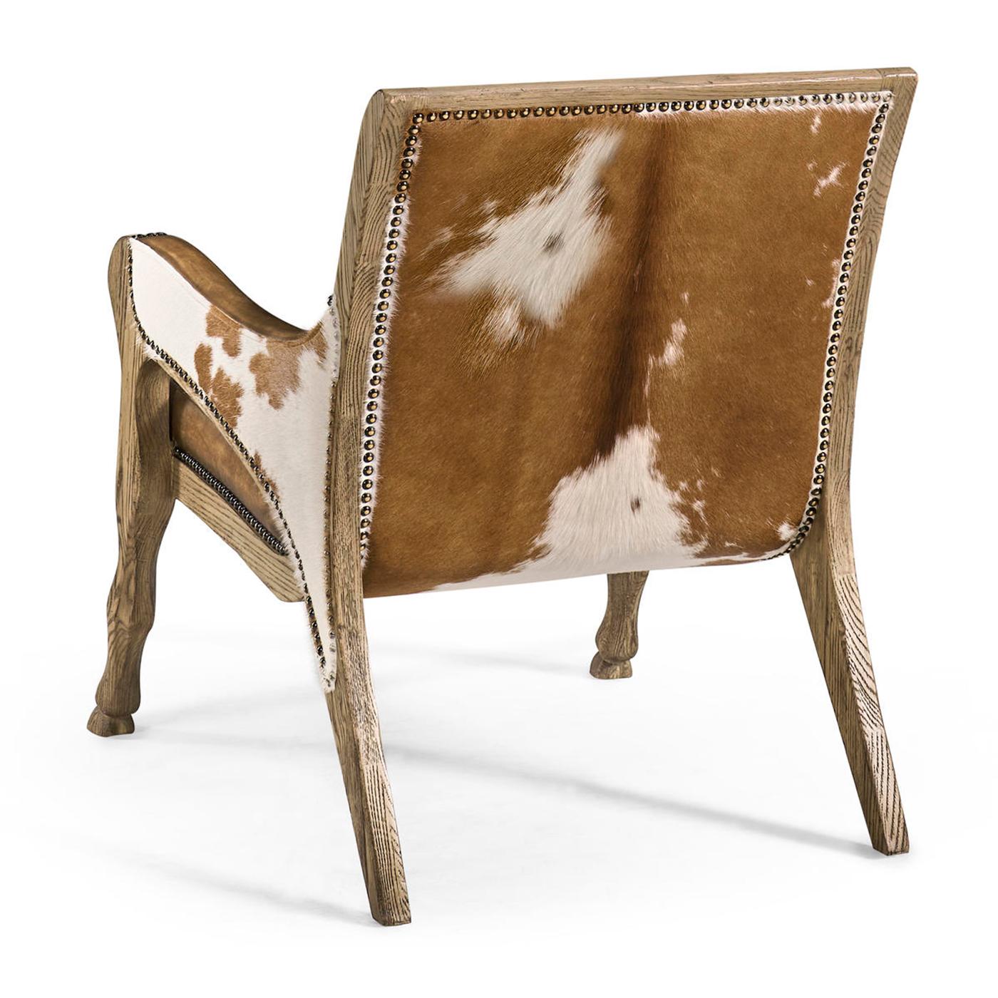 https://a.1stdibscdn.com/rustic-western-leather-hide-accent-chair-for-sale-picture-2/f_8038/f_480696821766264651417/image_1_master.jpg