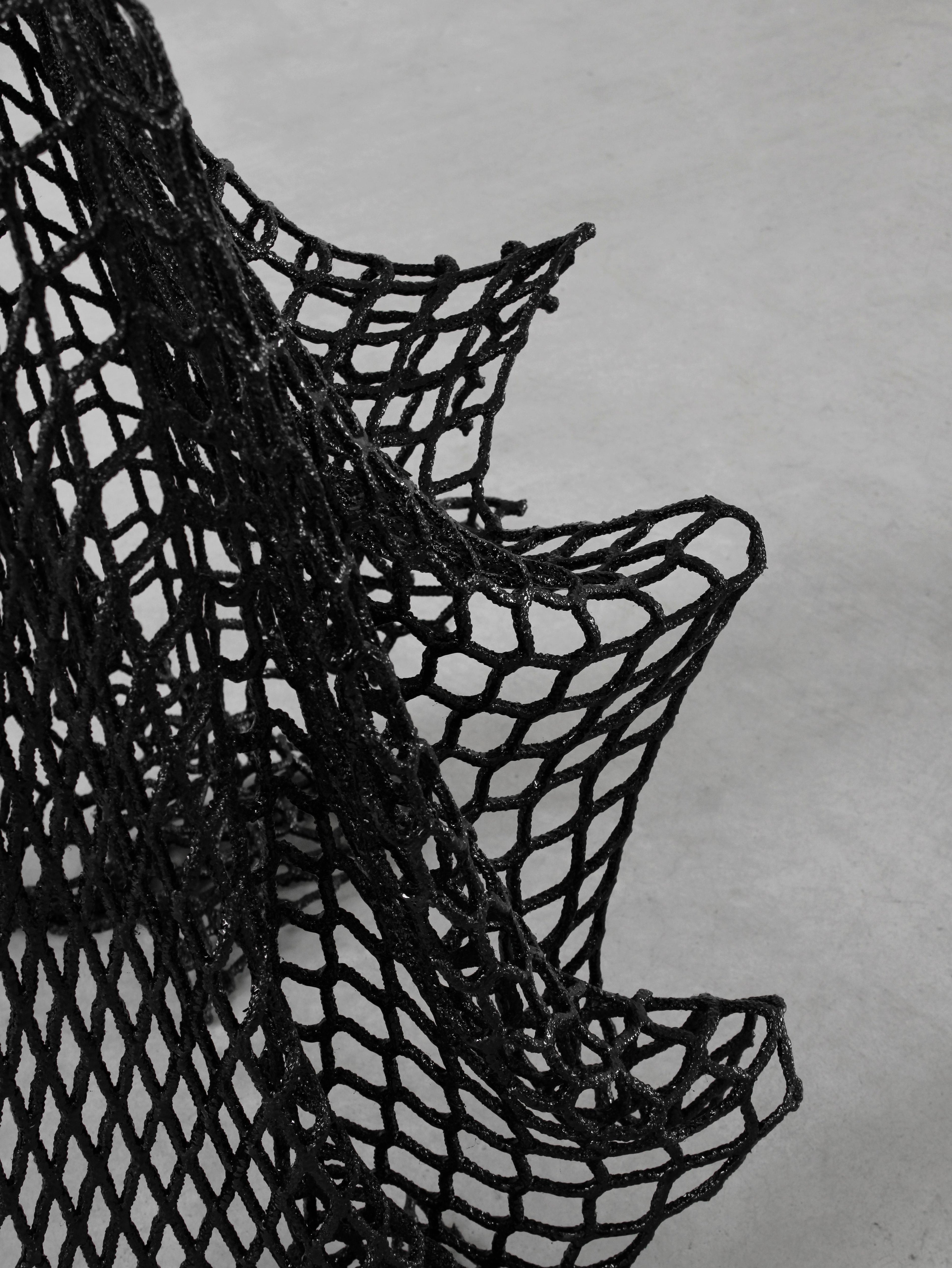 https://a.1stdibscdn.com/breeze-chair-made-with-reused-nets-and-epoxy-resin-by-iranzo-for-sale-picture-3/f_69342/f_492289621773482859443/iranzo_breezechair_detail1_HR_master.jpg