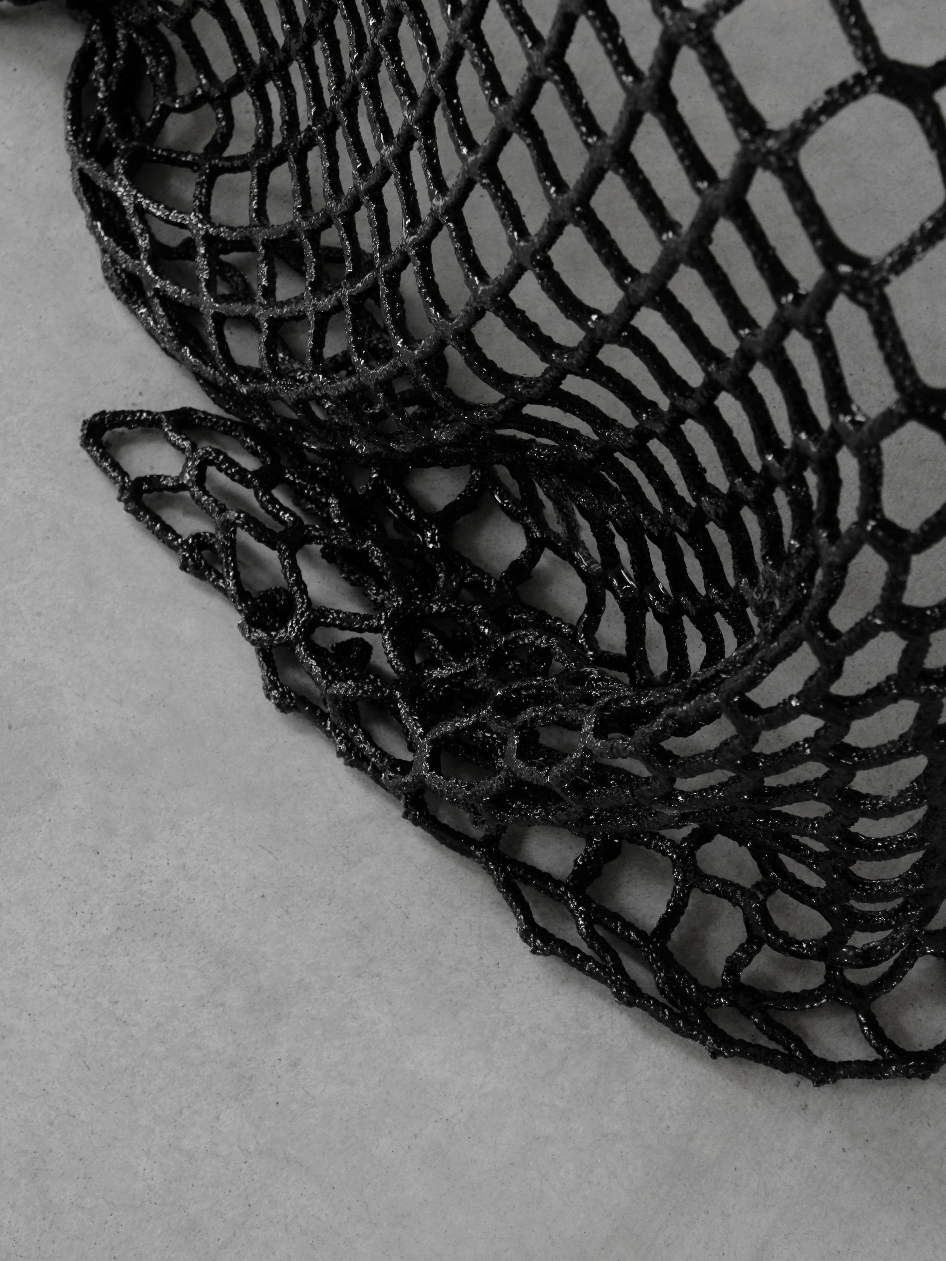 https://a.1stdibscdn.com/breeze-chair-made-with-reused-nets-and-epoxy-resin-by-iranzo-for-sale-picture-4/f_69342/f_492289621773482859339/iranzo_breezechair_detail2_HR_master.jpg