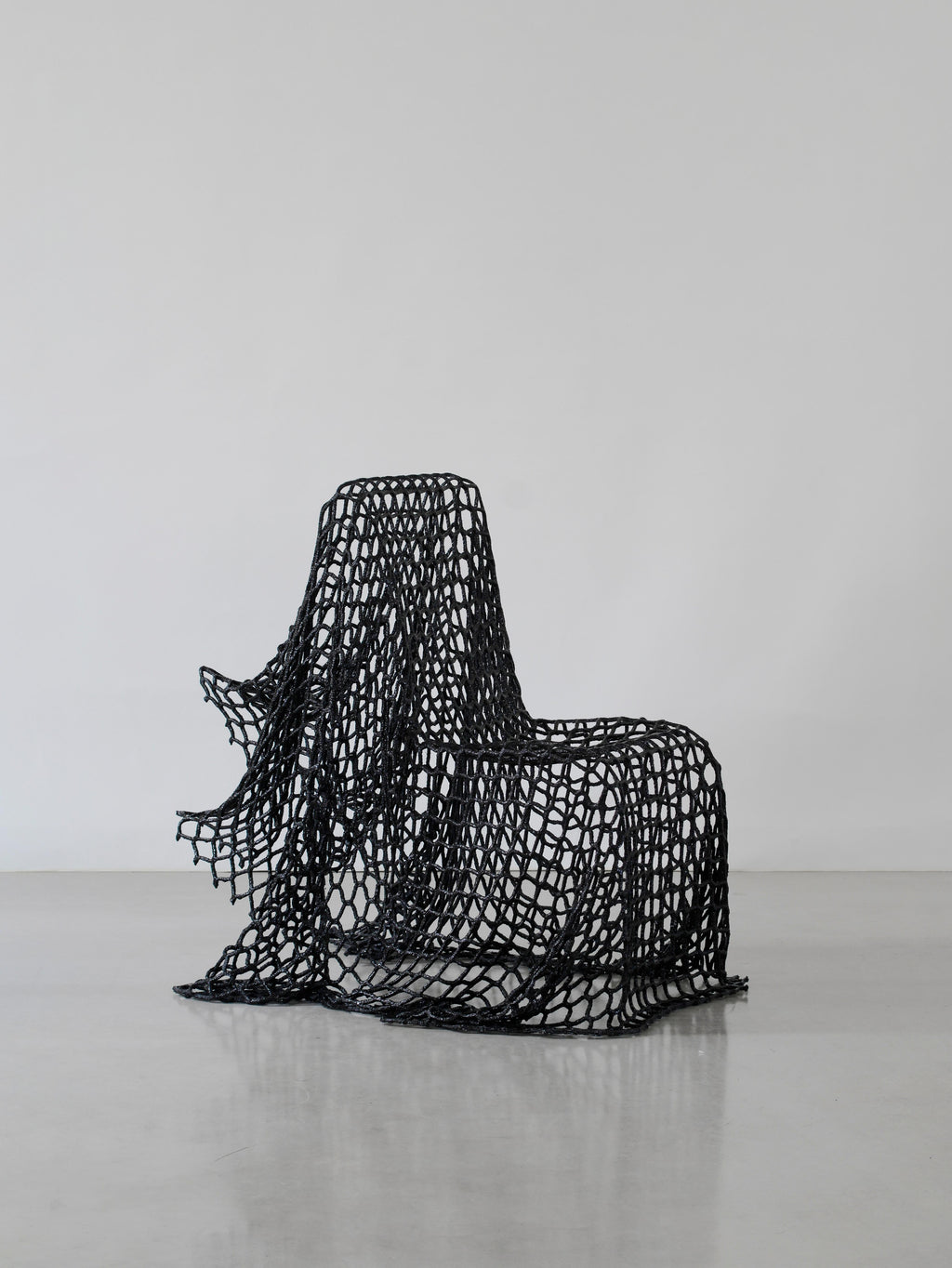 https://a.1stdibscdn.com/breeze-chair-made-with-reused-nets-and-epoxy-resin-by-iranzo-for-sale-picture-2/f_69342/f_492289621773482859253/iranzo_breezechair_perspective1_HR_master.jpg