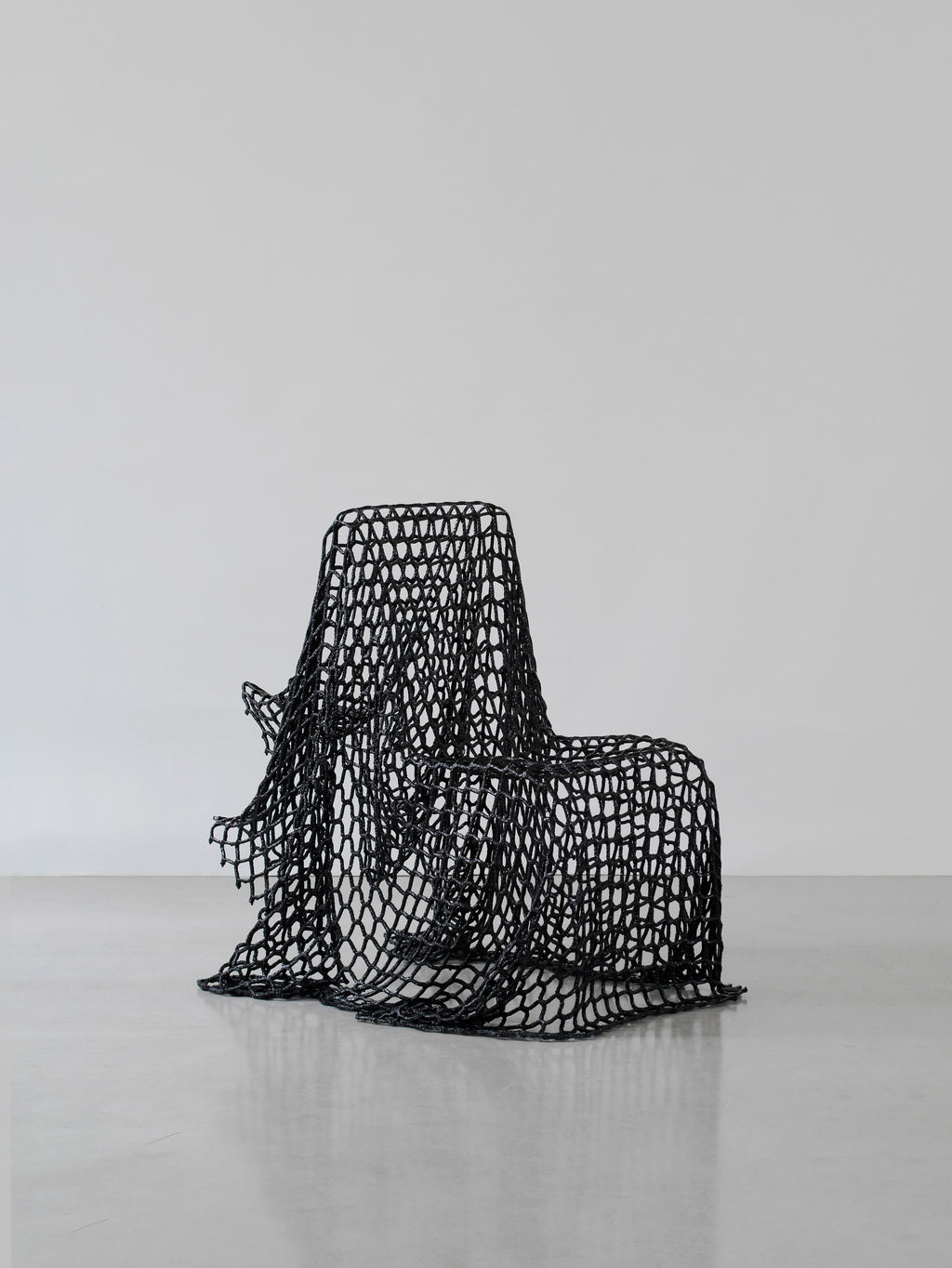 https://a.1stdibscdn.com/breeze-chair-made-with-reused-nets-and-epoxy-resin-by-iranzo-for-sale-picture-5/f_69342/f_492289621773482859320/iranzo_breezechair_perspective2_HR_master.jpg