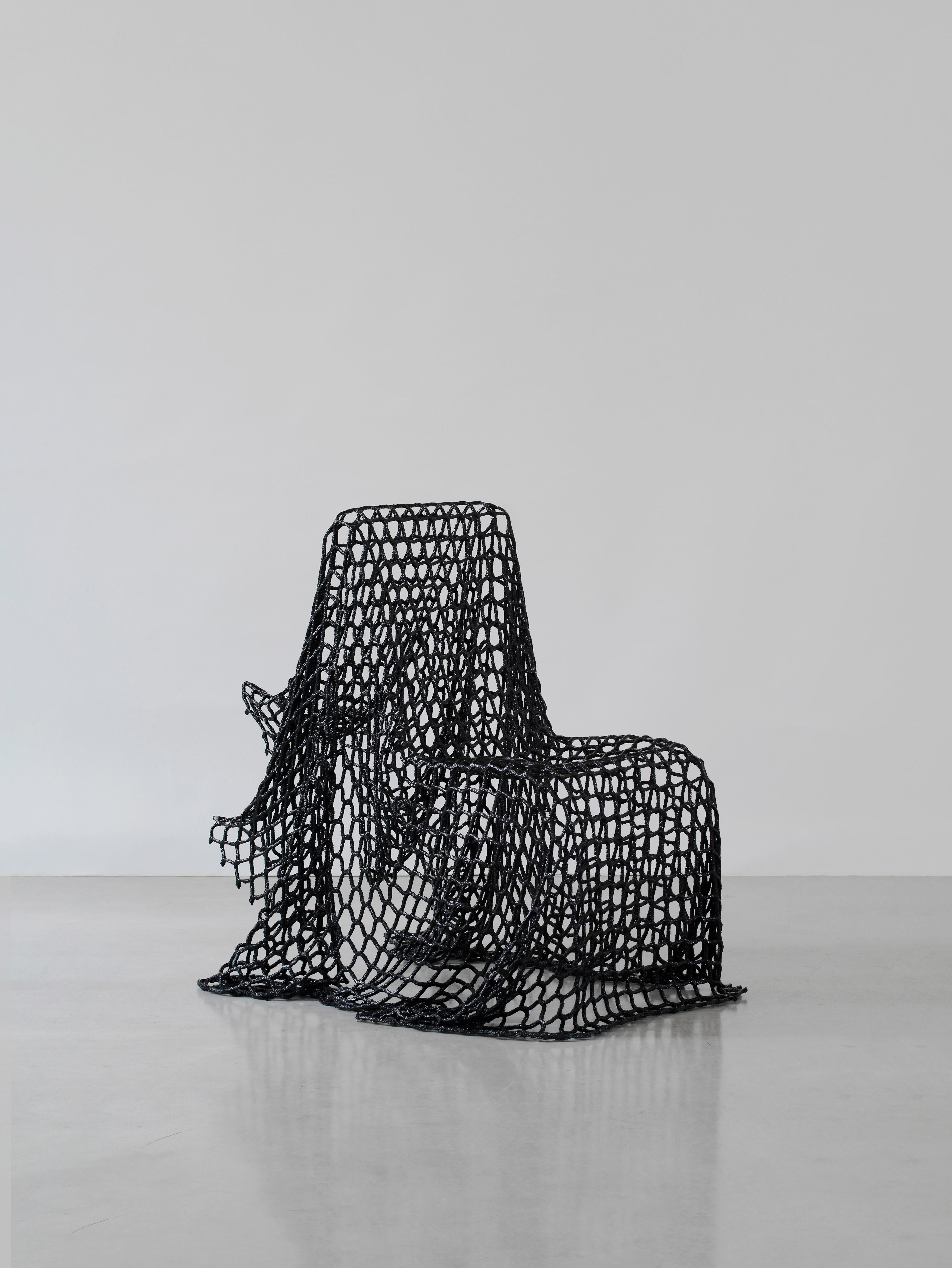 https://a.1stdibscdn.com/breeze-chair-made-with-reused-nets-and-epoxy-resin-by-iranzo-for-sale-picture-5/f_69342/f_492289621773482859320/iranzo_breezechair_perspective2_HR_master.jpg