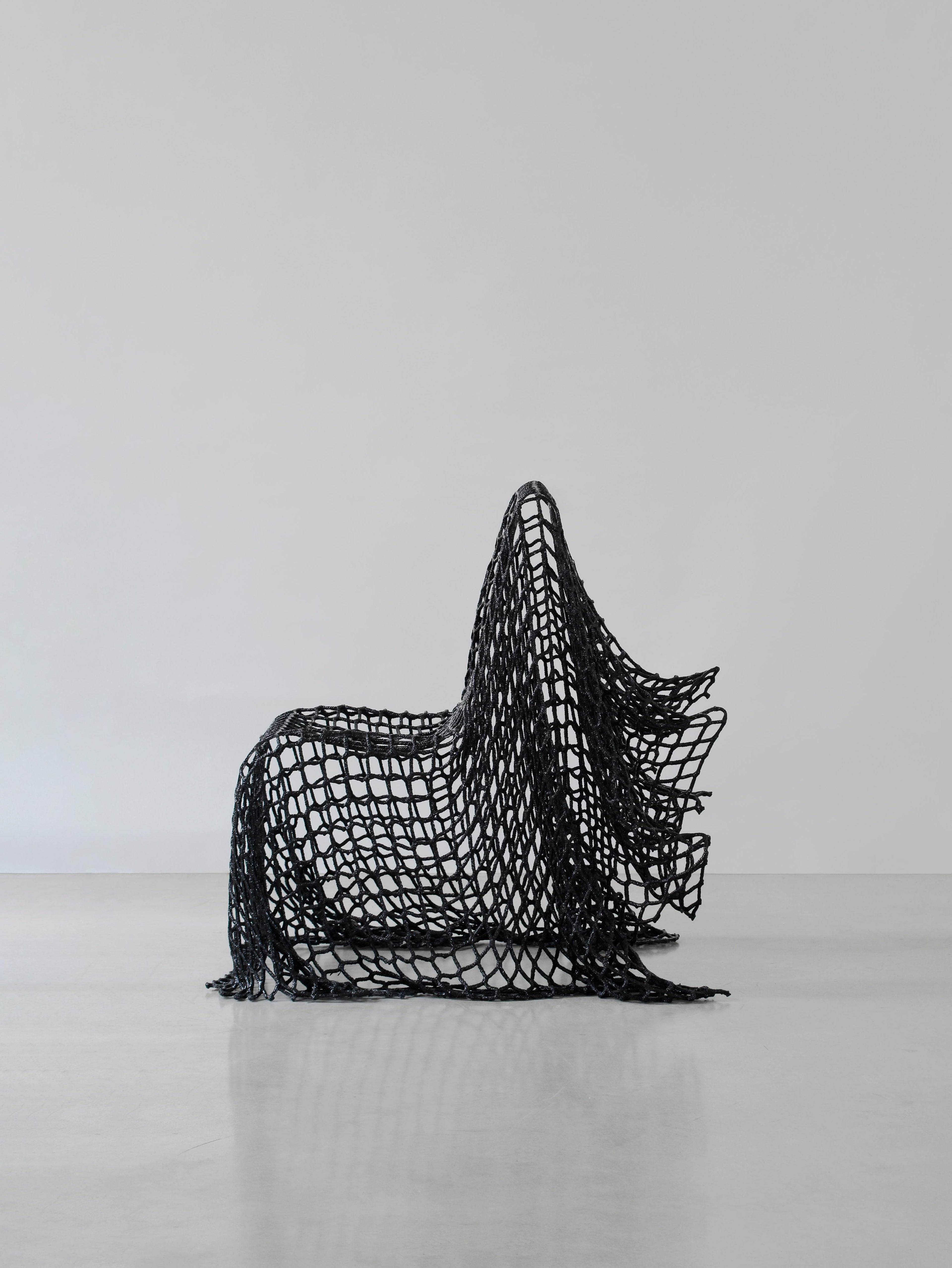 https://a.1stdibscdn.com/breeze-chair-made-with-reused-nets-and-epoxy-resin-by-iranzo-for-sale-picture-6/f_69342/f_492289621773482859304/iranzo_breezechair_side_HR_master.jpg