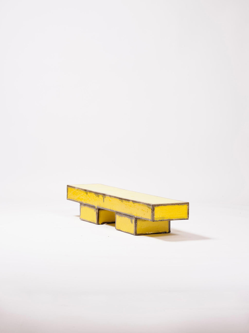 https://a.1stdibscdn.com/contemporary-ceramic-coffeetable-bench-glazed-stoneware-yellow-black-for-sale-picture-5/f_50491/f_310321521666862311749/jara_varela_APPARATU_BANCOS_ATRILES2689_master.jpg
