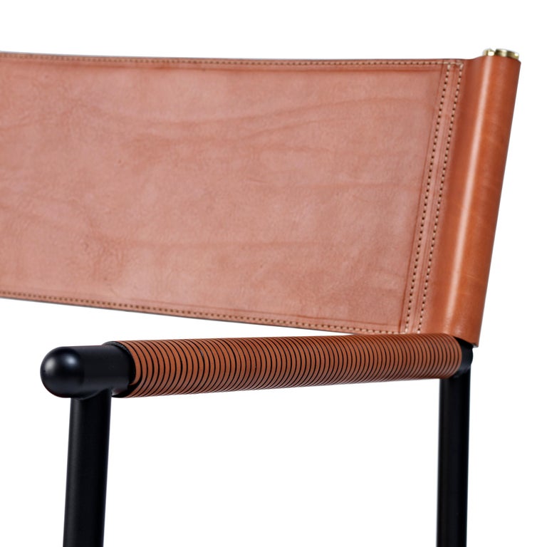 https://a.1stdibscdn.com/set-of-4-repose-counter-stool-w-backrest-natural-tan-saddle-black-rubbered-metal-for-sale-picture-3/f_40561/f_303544421662719409686/jovervalls_repose_armchair_naturaltobacco_blackpowder_detail_2__master.jpg?width=768