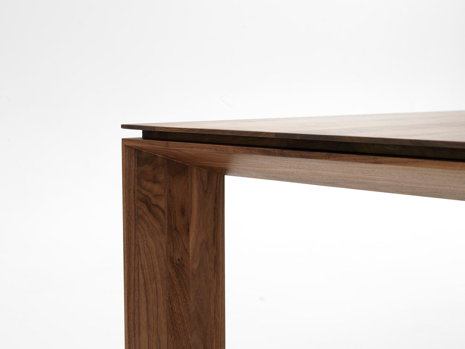 https://a.1stdibscdn.com/kluskens-portofino-dining-table-in-solid-walnut-for-sale-picture-3/f_60392/f_410512921723541734486/kem_847_008_master.jpg