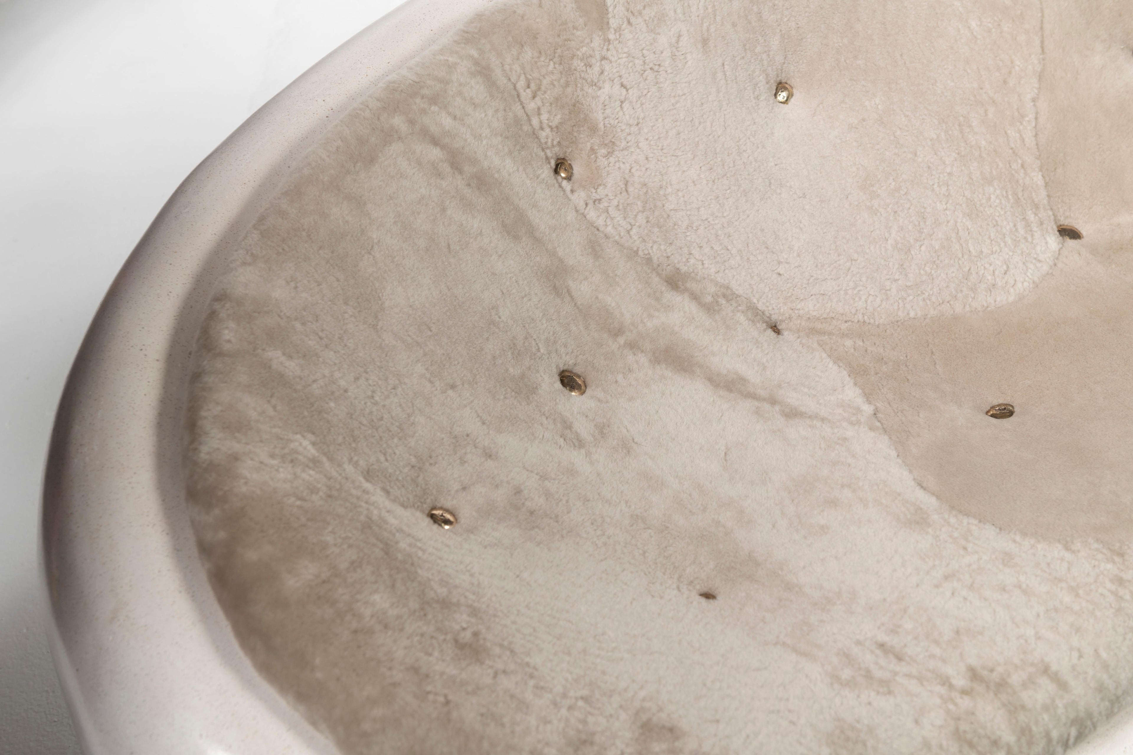 https://a.1stdibscdn.com/custom-sofa-in-marble-composite-with-upholstered-shearling-by-rogan-gregory-for-sale-picture-2/f_70412/f_307533321665166526969/kenfulk_20221004_0324_master.jpg