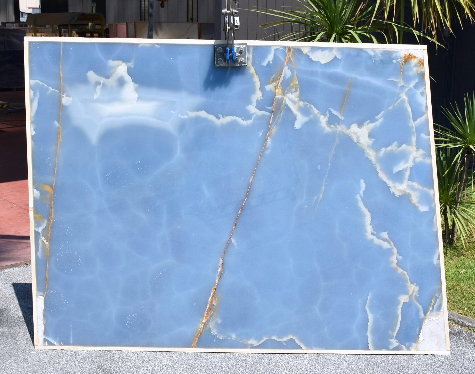 https://a.1stdibscdn.com/dining-table-rings-mirror-steel-base-sculpture-top-blue-onyx-marble-made-italy-for-sale-picture-2/f_22003/f_321506121673364520115/lastra_3_master.JPG