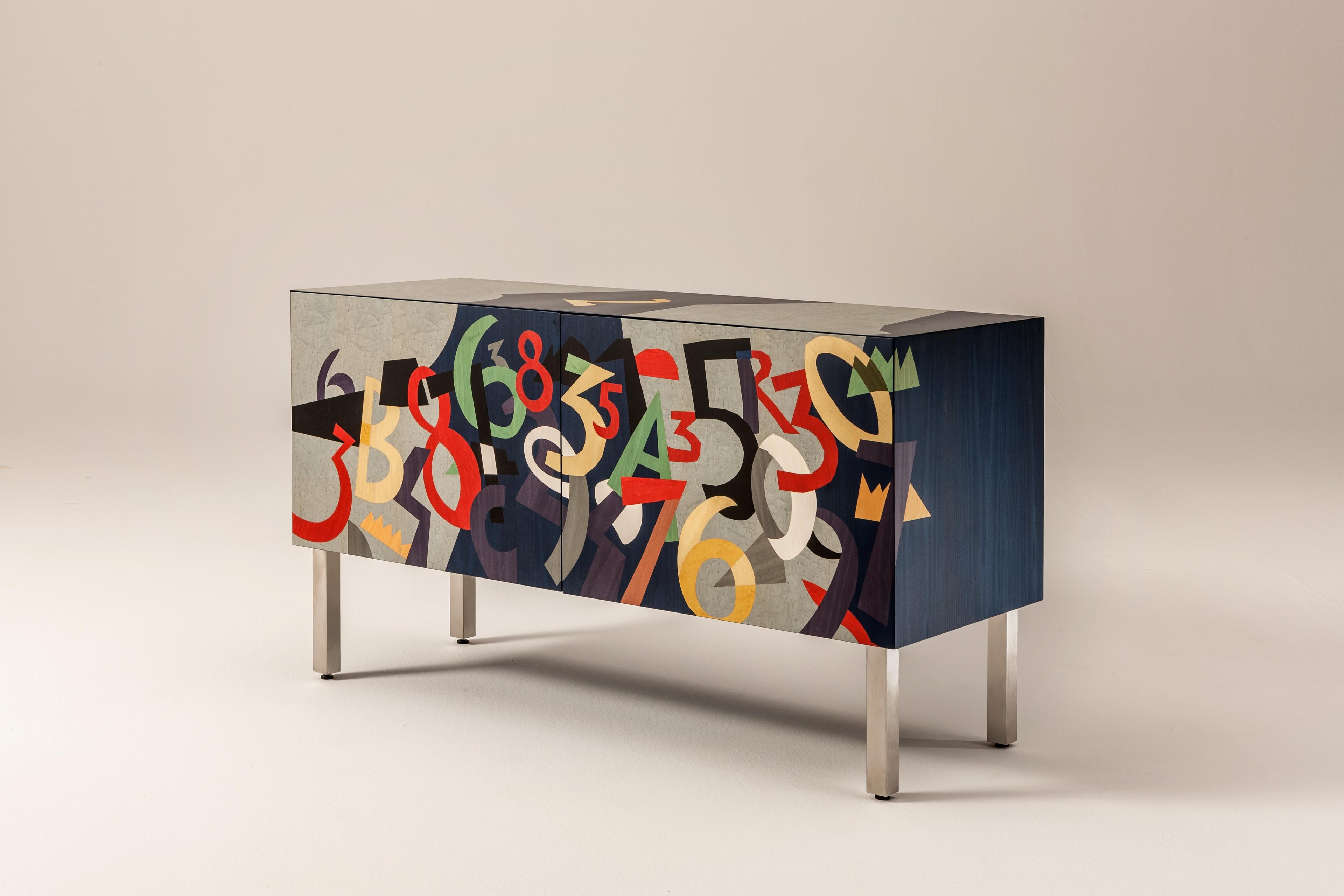 https://a.1stdibscdn.com/laurameroni-numeri-limited-edition-inlaid-sideboard-by-ugo-nespolo-for-sale-picture-2/f_52792/f_235458221619532061820/laurameroni_intarsia_numeri_ugo_nespolo_hd_01_master.jpg