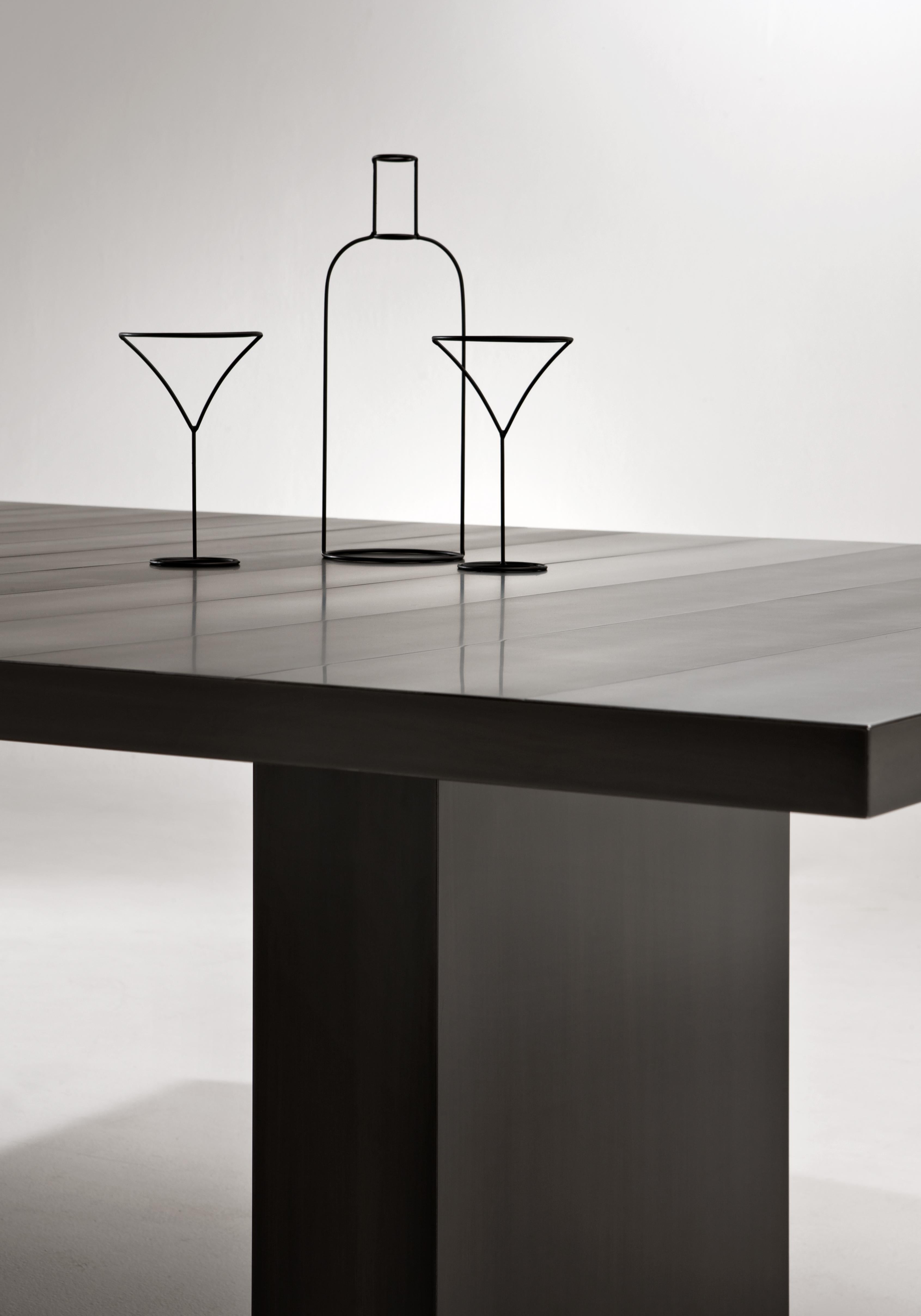 https://a.1stdibscdn.com/laurameroni-st-51-custom-rectangular-metal-dining-table-in-black-iron-cenere-for-sale-picture-4/f_52792/f_235846421666604468665/laurameroni_st_51_table_black_iron_03_master.jpg
