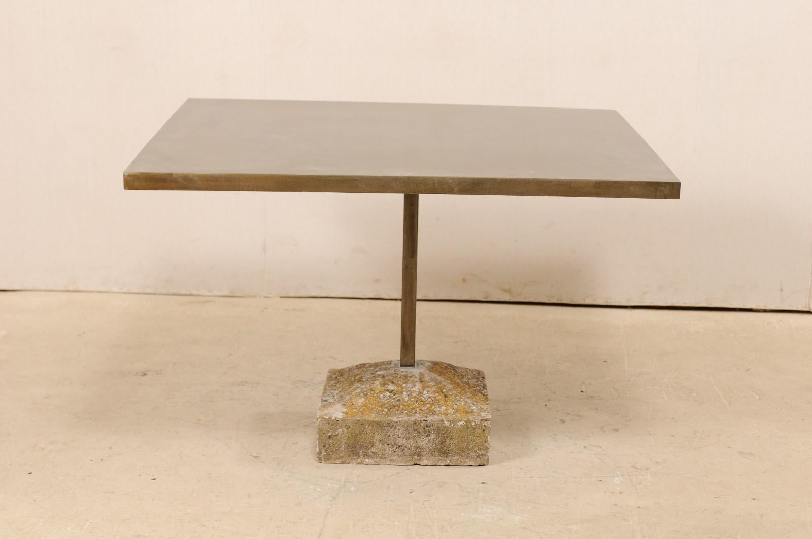 https://a.1stdibscdn.com/an-artisan-made-custom-4-ft-square-iron-top-table-on-stone-plinth-base-for-sale-picture-4/f_8764/1579552387312/lrgtable1568_10__master.jpg