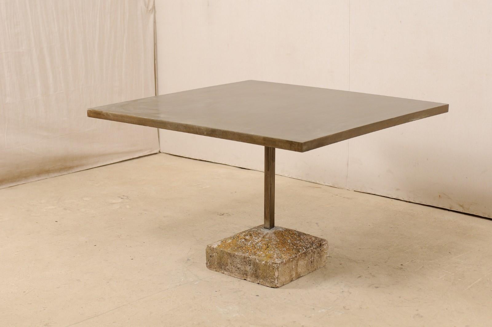 https://a.1stdibscdn.com/an-artisan-made-custom-4-ft-square-iron-top-table-on-stone-plinth-base-for-sale-picture-11/f_8764/1579552387579/lrgtable1568_11__master.jpg