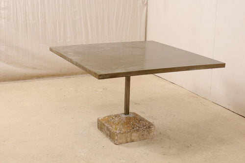 https://a.1stdibscdn.com/an-artisan-made-custom-4-ft-square-iron-top-table-on-stone-plinth-base-for-sale-picture-2/f_8764/1579552385425/lrgtable1568_1__master.jpg