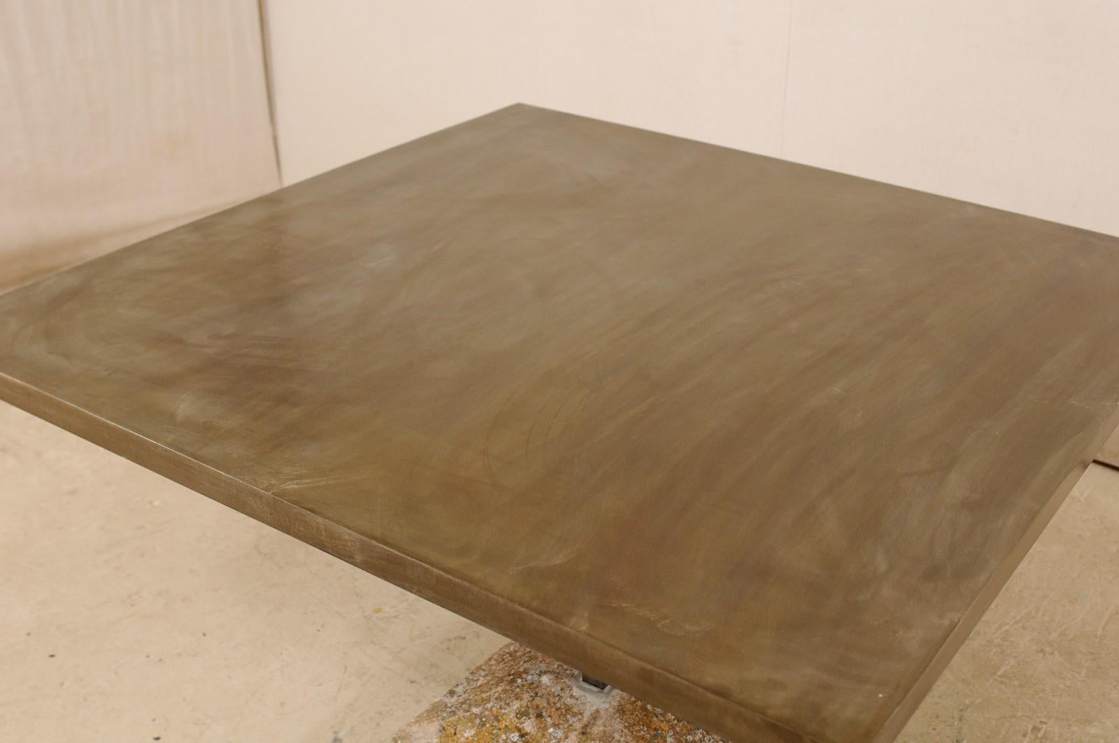 https://a.1stdibscdn.com/an-artisan-made-custom-4-ft-square-iron-top-table-on-stone-plinth-base-for-sale-picture-6/f_8764/1579552386822/lrgtable1568_2__master.jpg