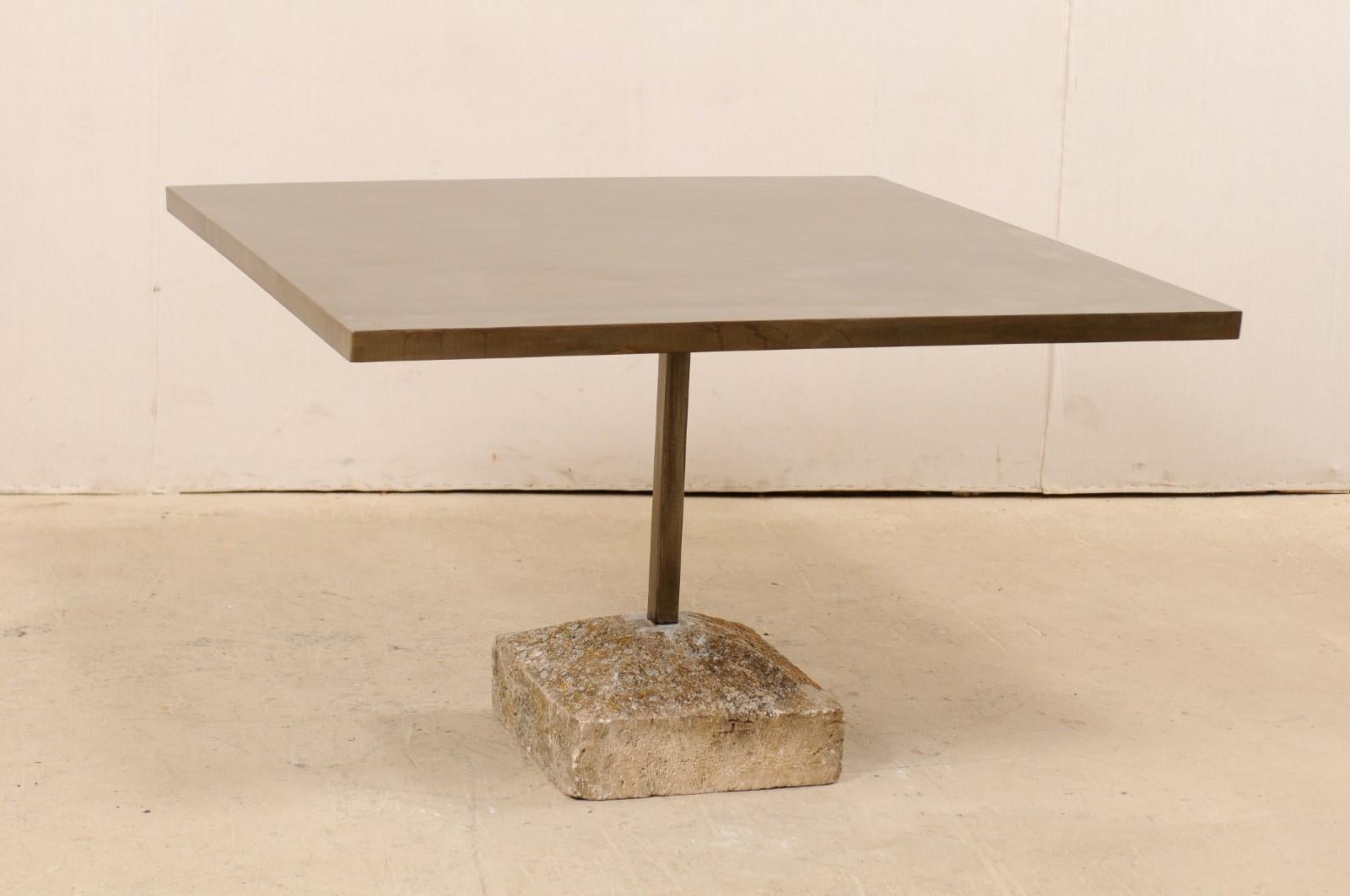 https://a.1stdibscdn.com/an-artisan-made-custom-4-ft-square-iron-top-table-on-stone-plinth-base-for-sale-picture-9/f_8764/1579552388071/lrgtable1568_5__master.jpg