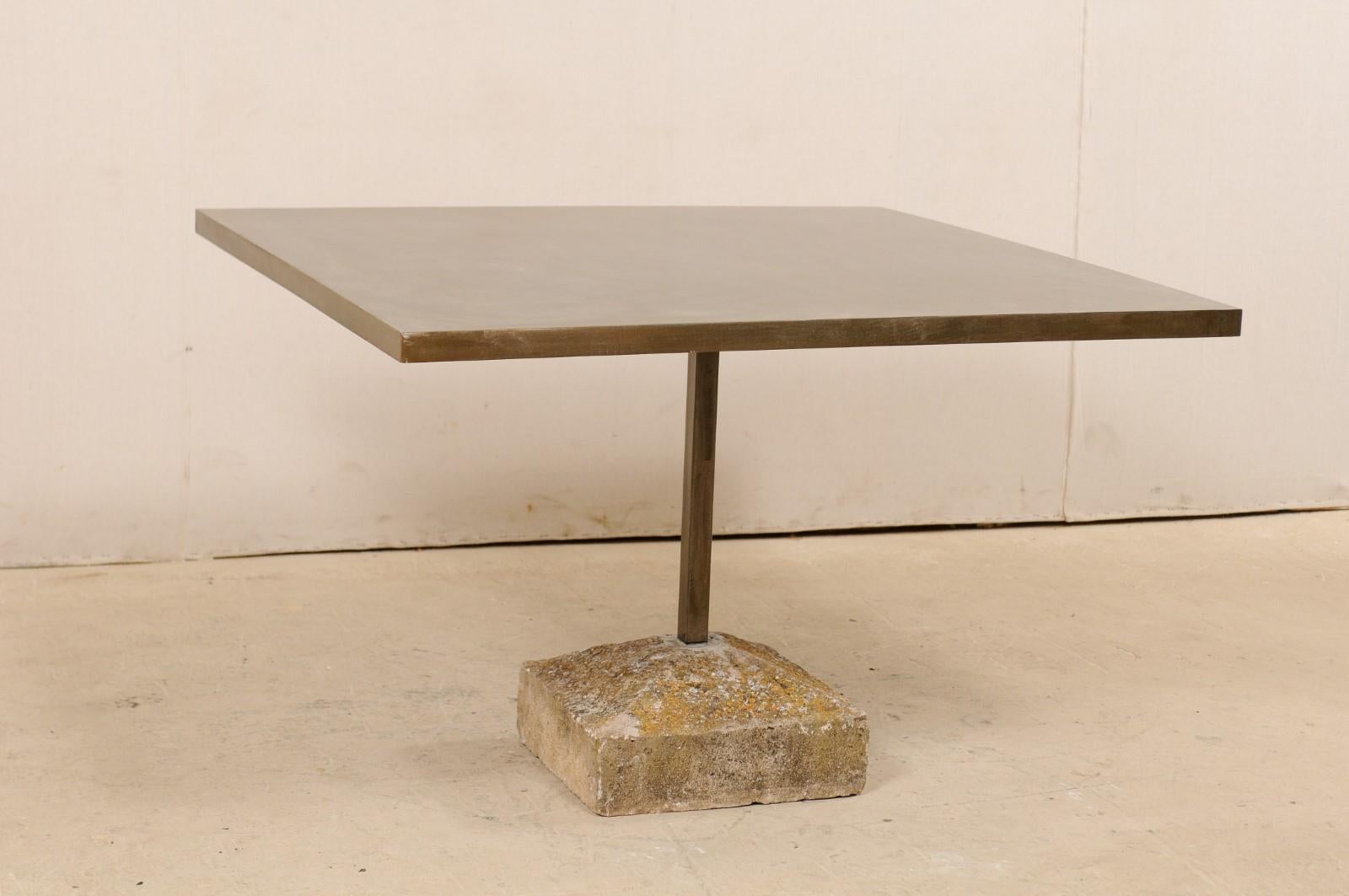 https://a.1stdibscdn.com/an-artisan-made-custom-4-ft-square-iron-top-table-on-stone-plinth-base-for-sale-picture-3/f_8764/1579552386454/lrgtable1568_9__master.jpg