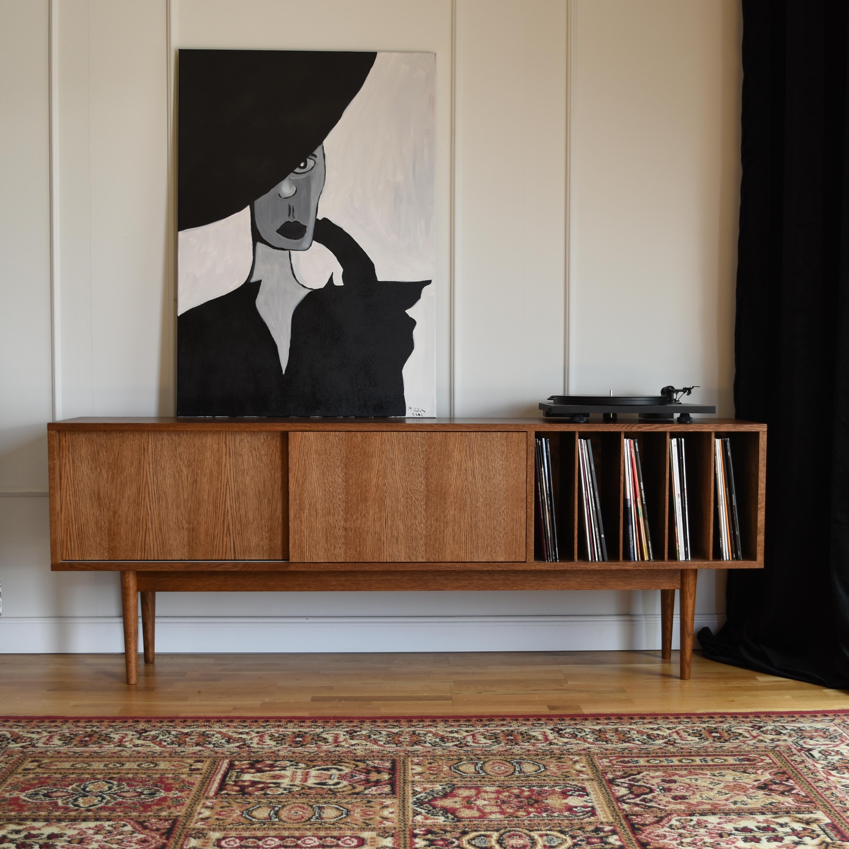 https://a.1stdibscdn.com/lotv-vinyl-slide-cabinet-by-pastform-for-sale-picture-5/f_12192/f_403409521719336711069/mid_century_sideboard_vinyl_1_master.jpg