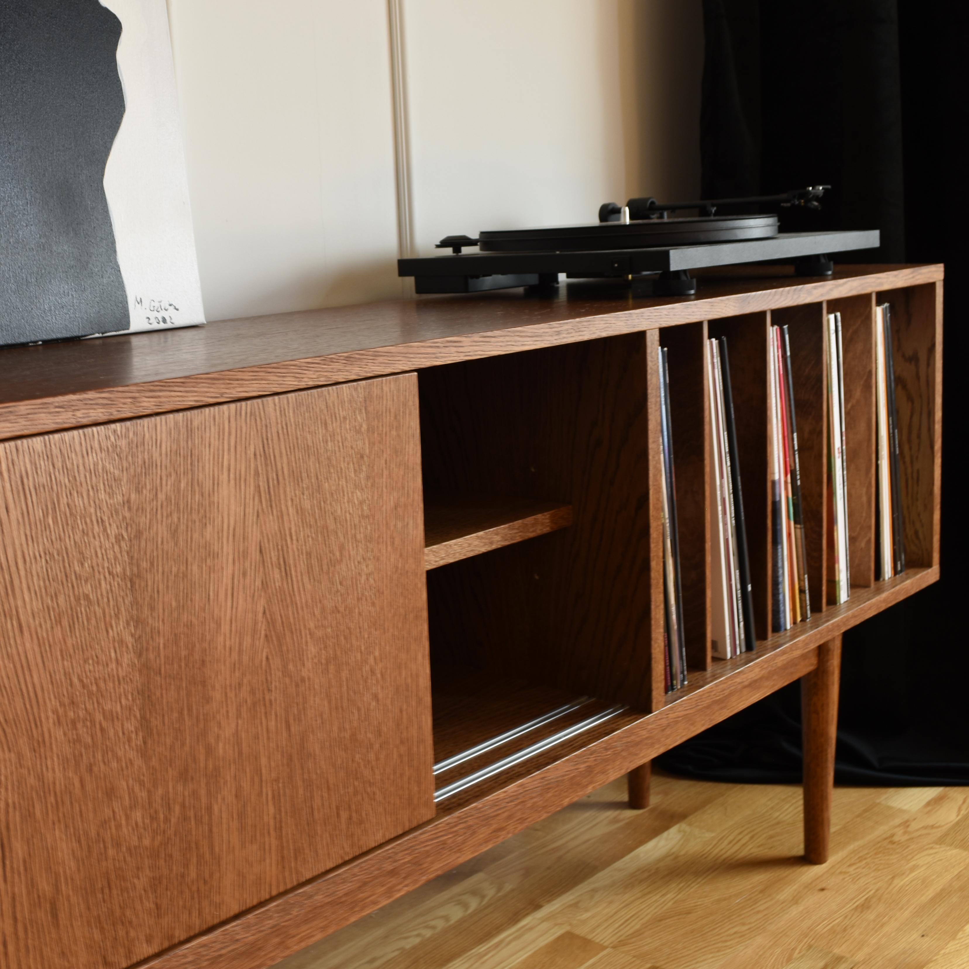 https://a.1stdibscdn.com/lotv-vinyl-slide-cabinet-by-pastform-for-sale-picture-4/f_12192/f_403409521719336711262/mid_century_sideboard_vinyl_2_master.jpg