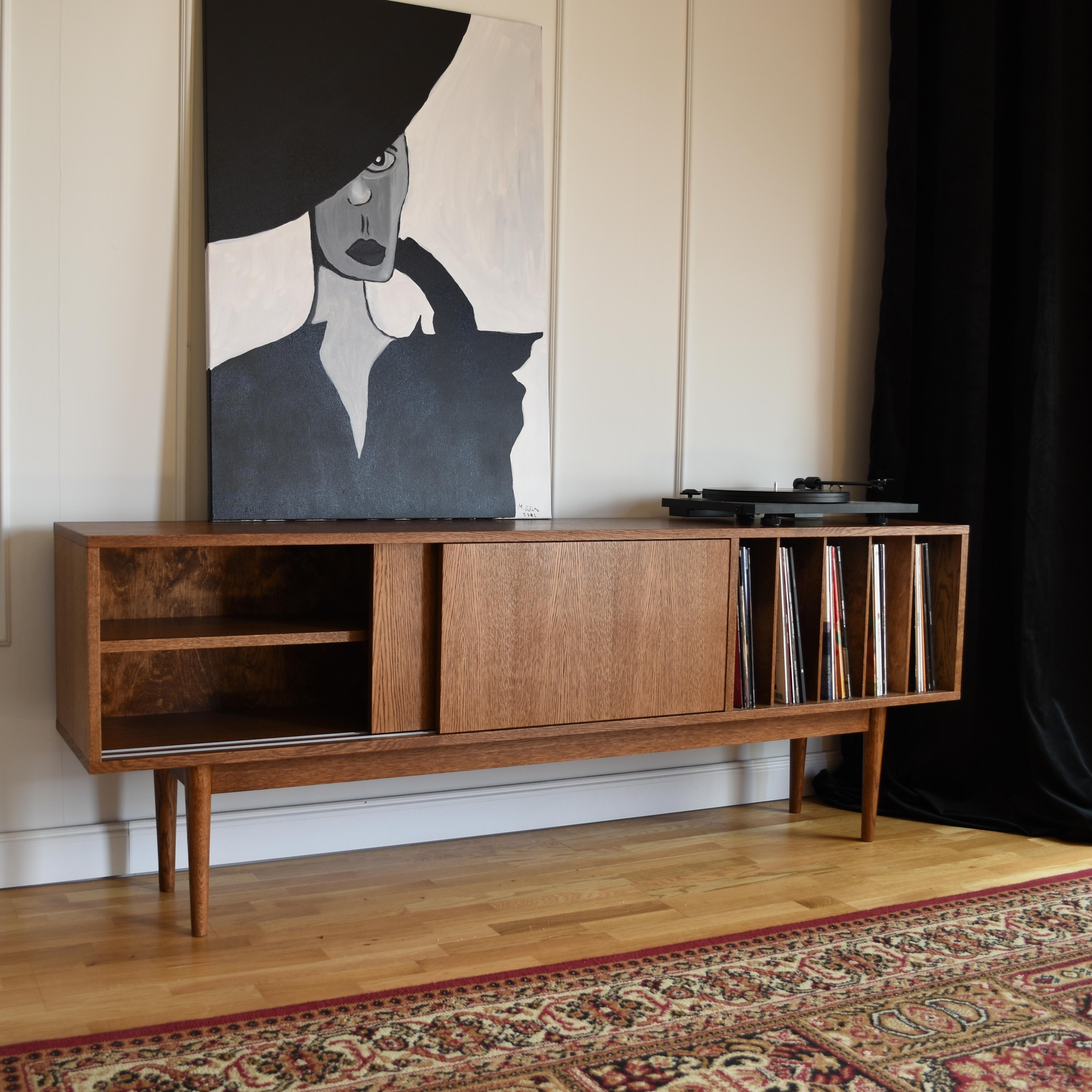 https://a.1stdibscdn.com/lotv-vinyl-slide-cabinet-by-pastform-for-sale-picture-6/f_12192/f_403409521719336713022/mid_century_sideboard_vinyl_3_master.jpg
