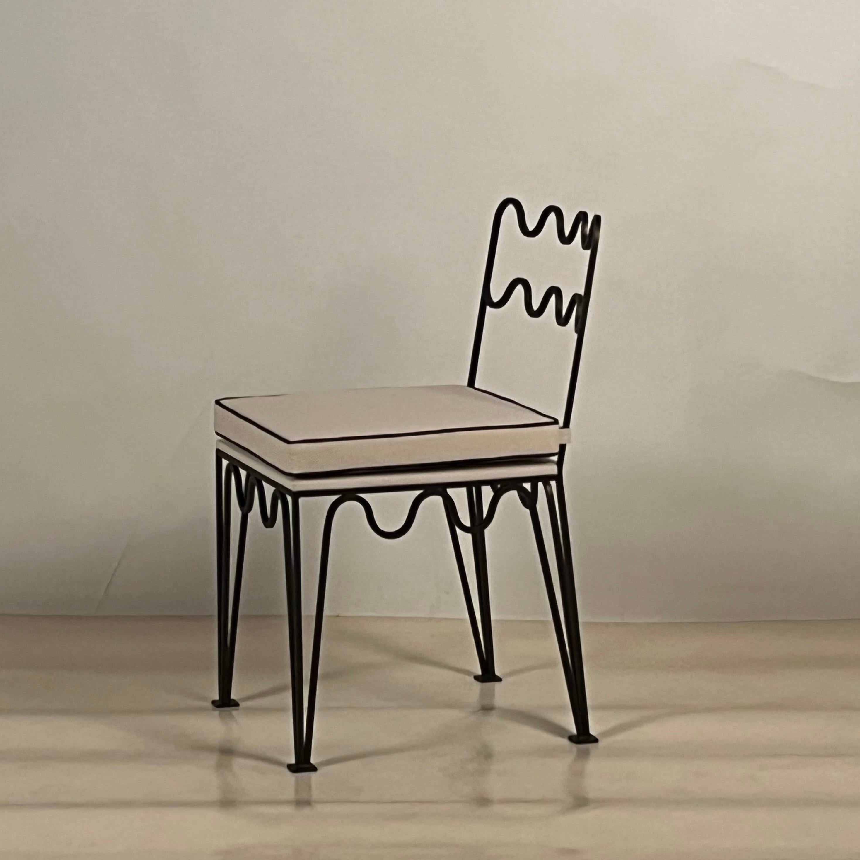 https://a.1stdibscdn.com/pair-of-undulating-meandre-chairs-by-design-freres-for-sale-picture-5/f_8184/1682878258519/mobilejpegupload_07DCDD3A7C7C416FA35EDB8B11CD4C78_master.jpg