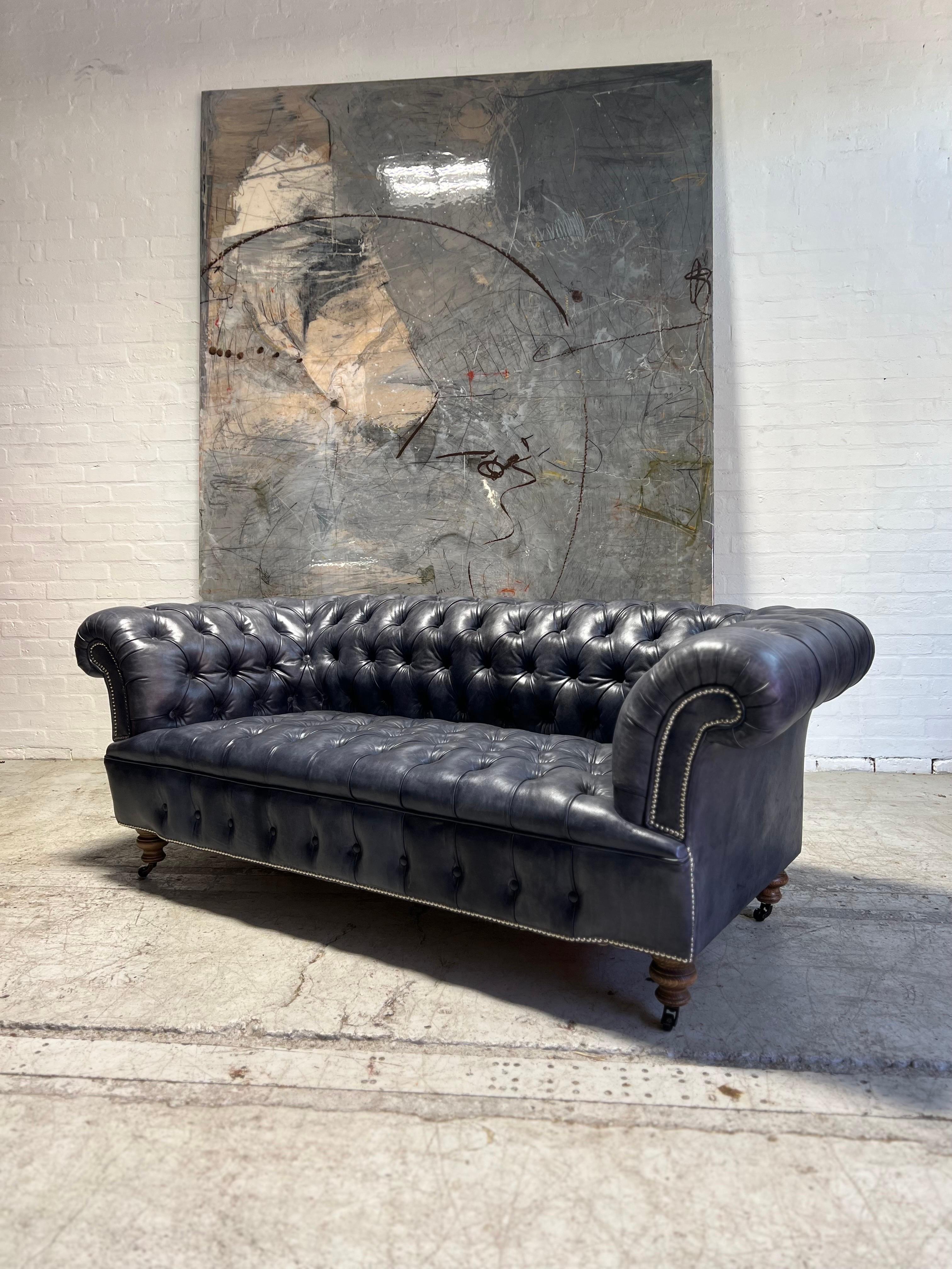 https://a.1stdibscdn.com/our-signature-howard-chesterfield-sofa-in-hand-dyed-elephant-grey-leather-for-sale-picture-5/f_79732/1677225862144/mobilejpegupload_0B0537F5D41944C199DC1955ADB7E3B2_master.jpg