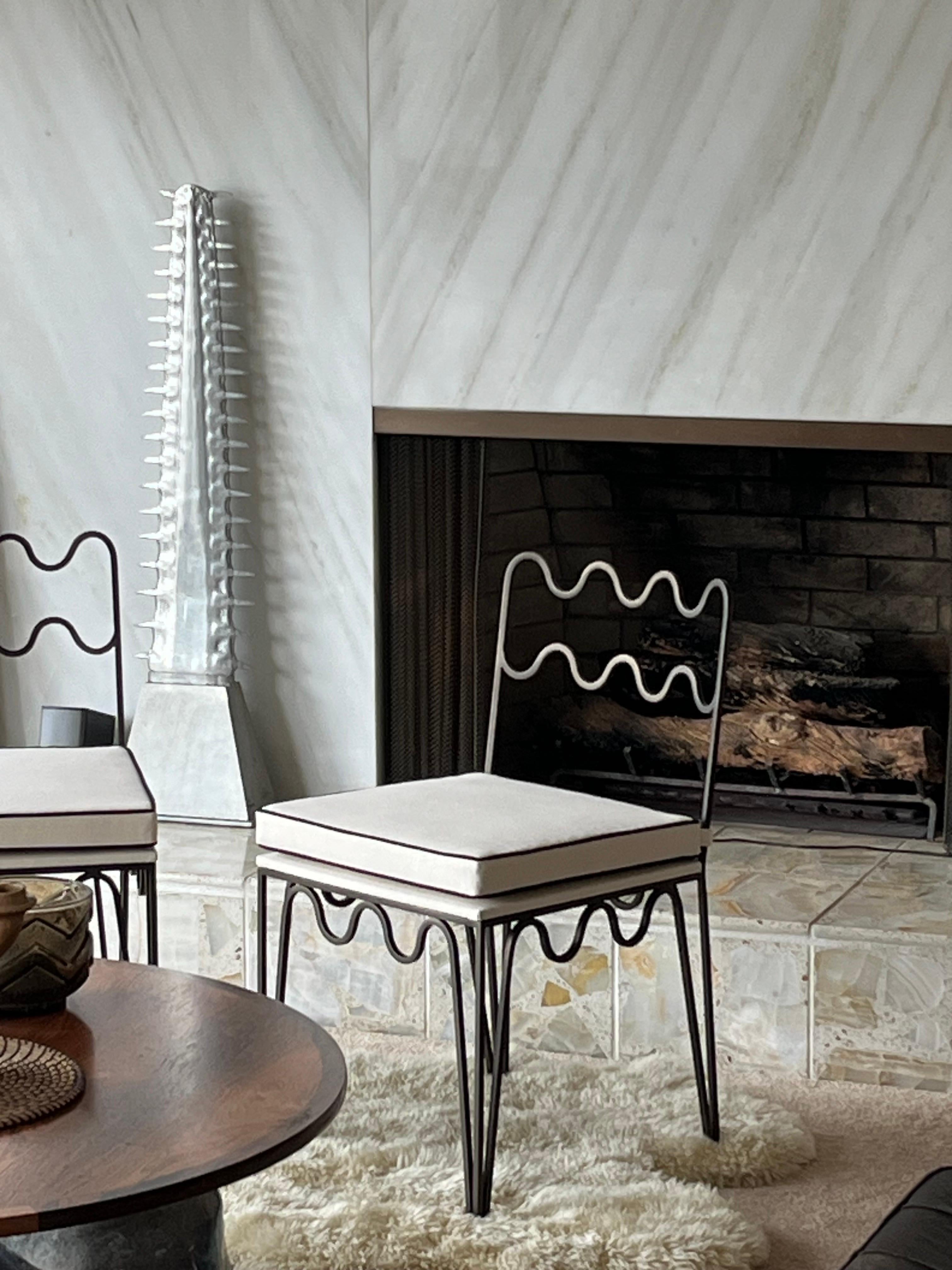 https://a.1stdibscdn.com/pair-of-undulating-meandre-chairs-by-design-freres-for-sale-picture-10/f_8184/f_34061692/mobilejpegupload_1683486433939_master.jpg