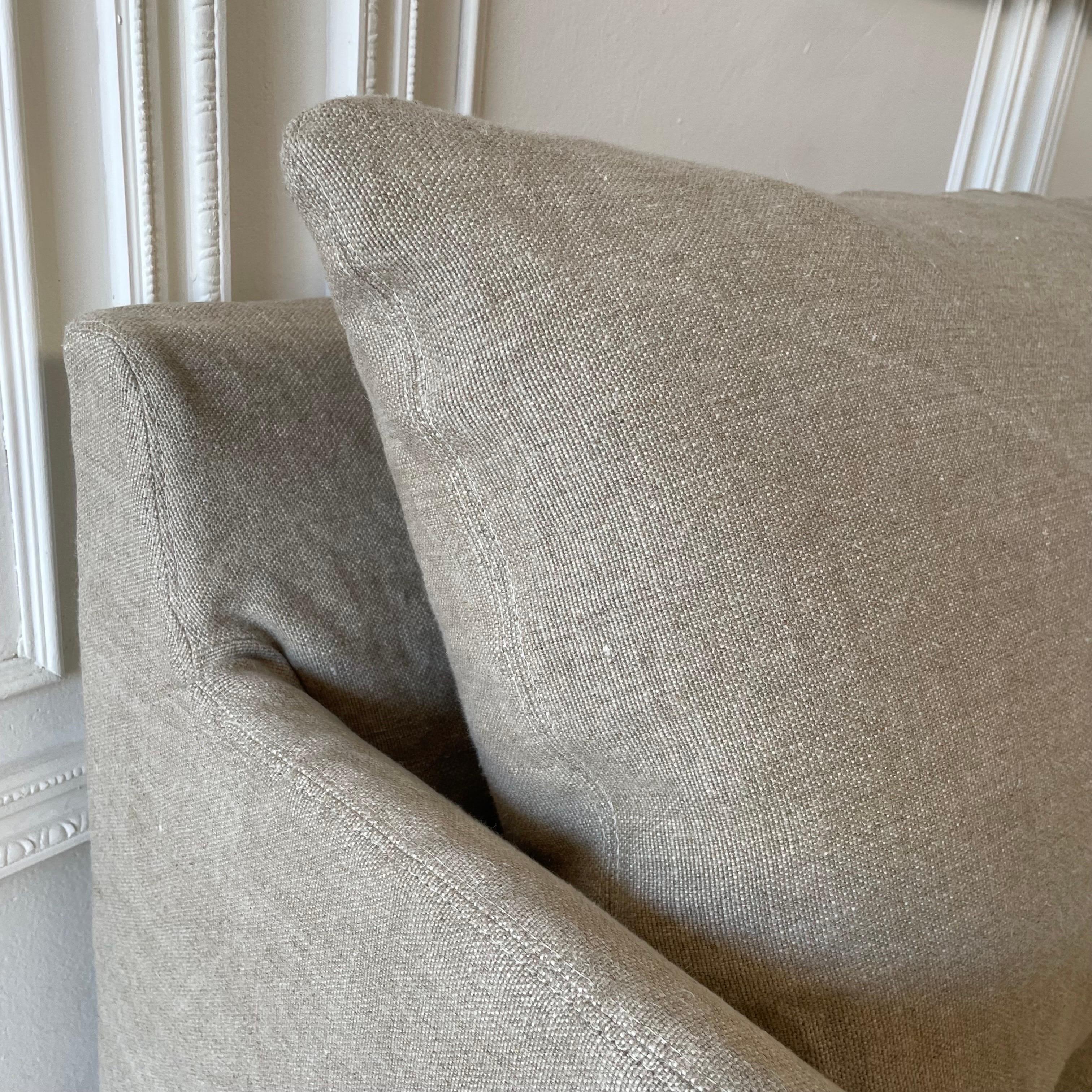 https://a.1stdibscdn.com/new-custom-stone-washed-irish-linen-slip-covered-sofa-with-down-alt-cushions-for-sale-picture-20/f_18223/1669674822261/mobilejpegupload_179B5CB0F8374C6D9A787020369D6712_master.jpg