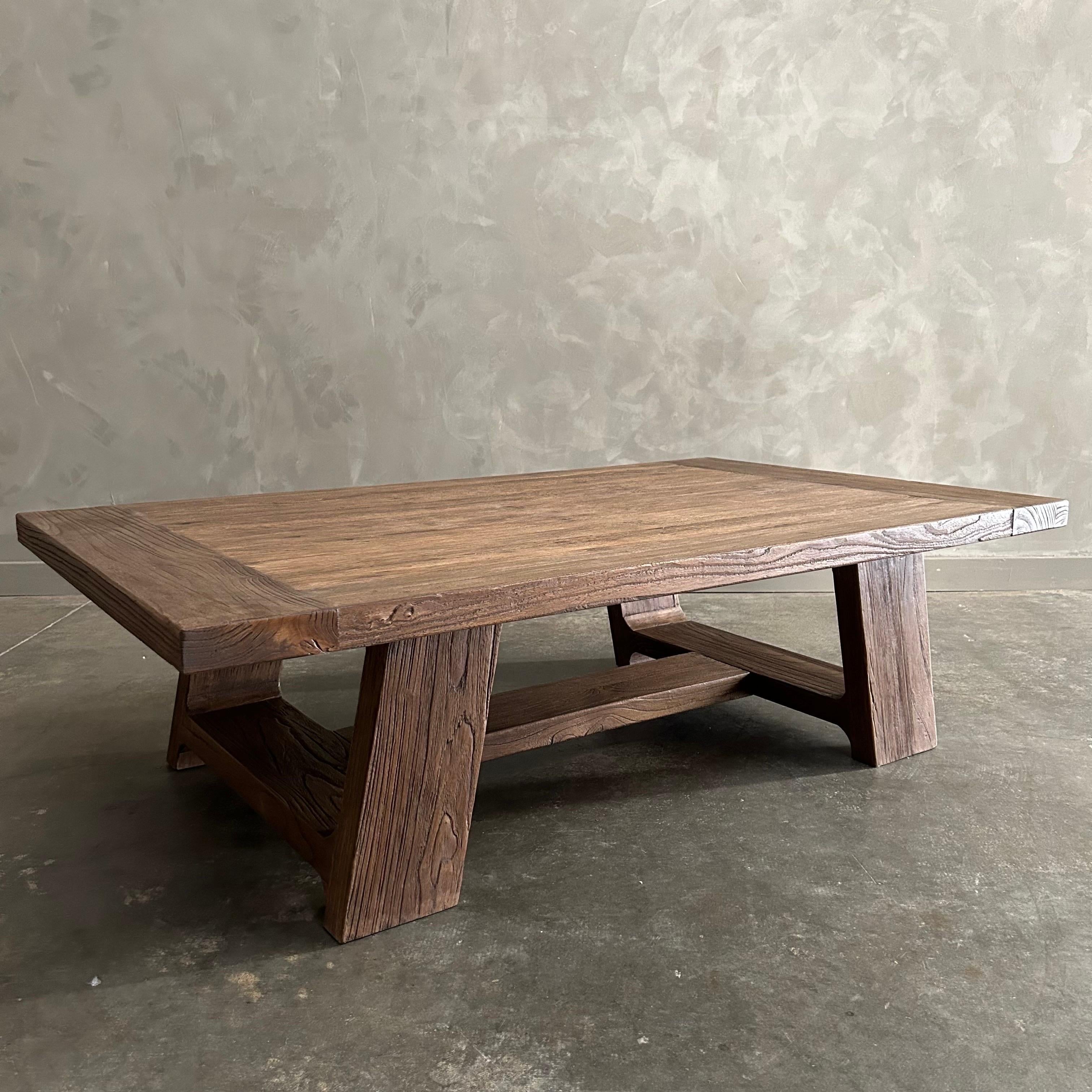 https://a.1stdibscdn.com/reclaimed-elm-wood-coffee-table-in-walnut-finish-for-sale-picture-10/f_18223/f_468886121759354747980/mobilejpegupload_1DA755935E824032AEDCEC5547AC9658_master.jpg