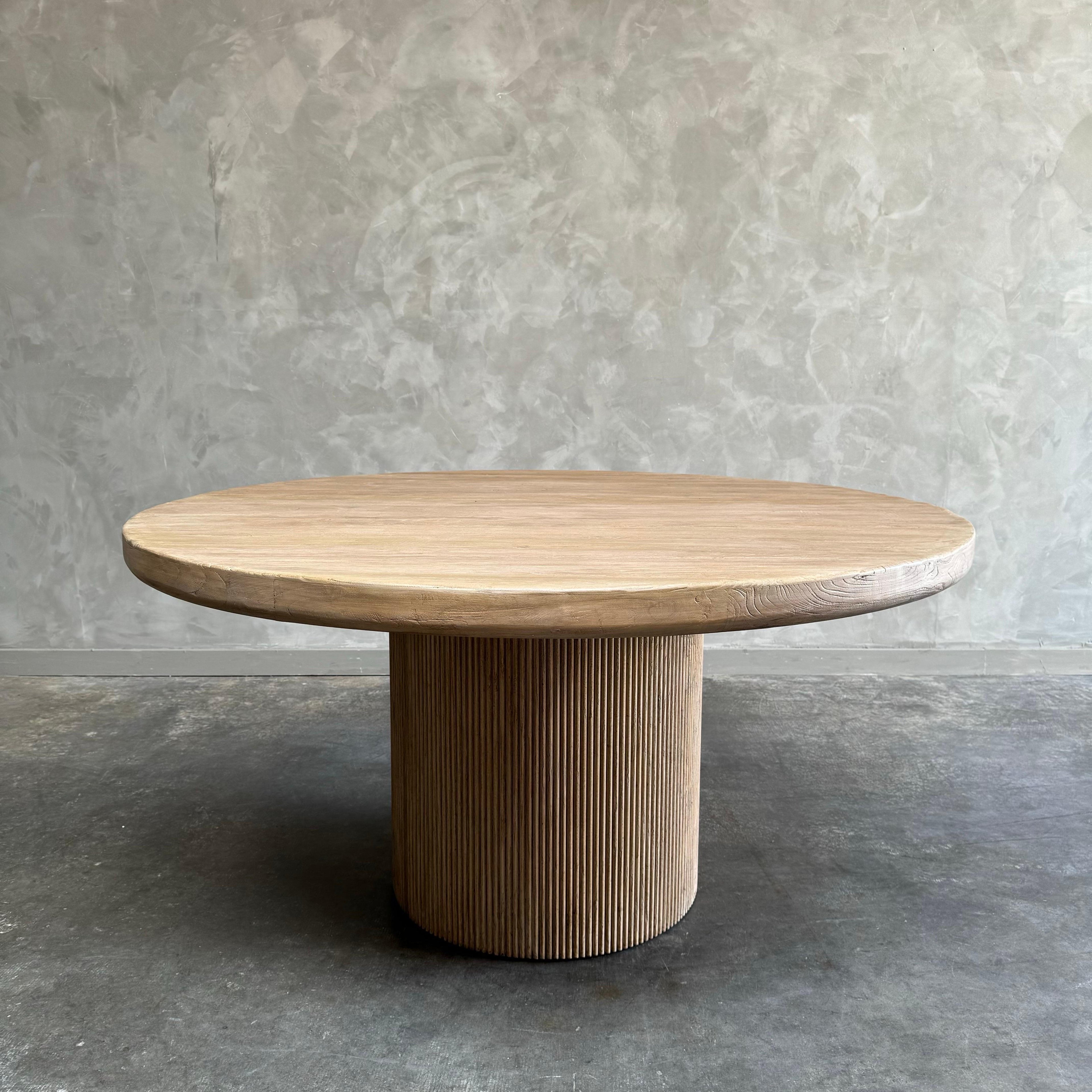 https://a.1stdibscdn.com/round-elm-wood-reeded-dining-table-60-for-sale-picture-3/f_18223/f_467269121758314253340/mobilejpegupload_1FCD8EBD50AB4D209B52B2DDB8C1FBF9_master.jpg
