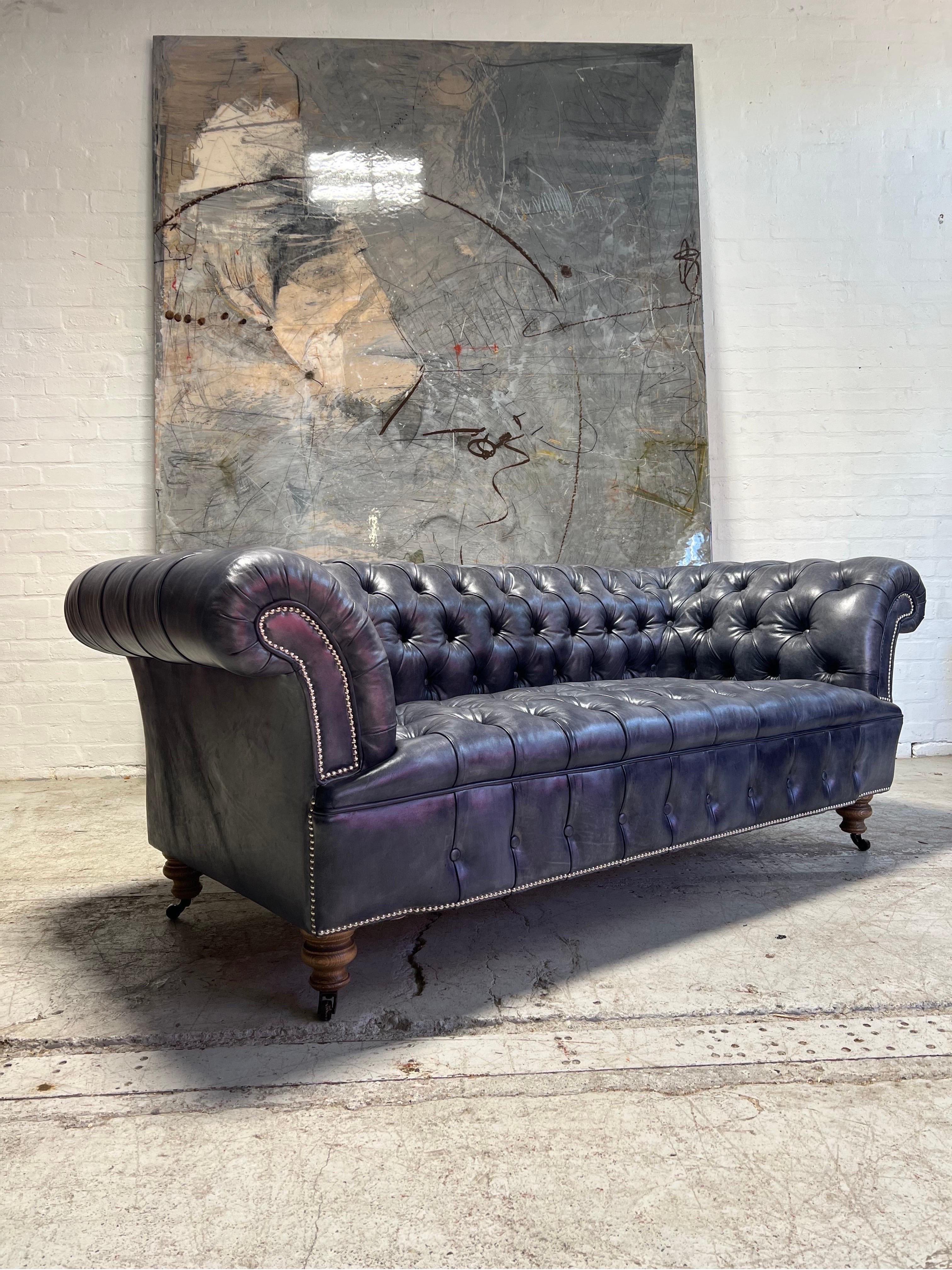 https://a.1stdibscdn.com/our-signature-howard-chesterfield-sofa-in-hand-dyed-elephant-grey-leather-for-sale-picture-3/f_79732/1677226967482/mobilejpegupload_1FD7B36730904E9883506D05EE53E3F4_master.jpg