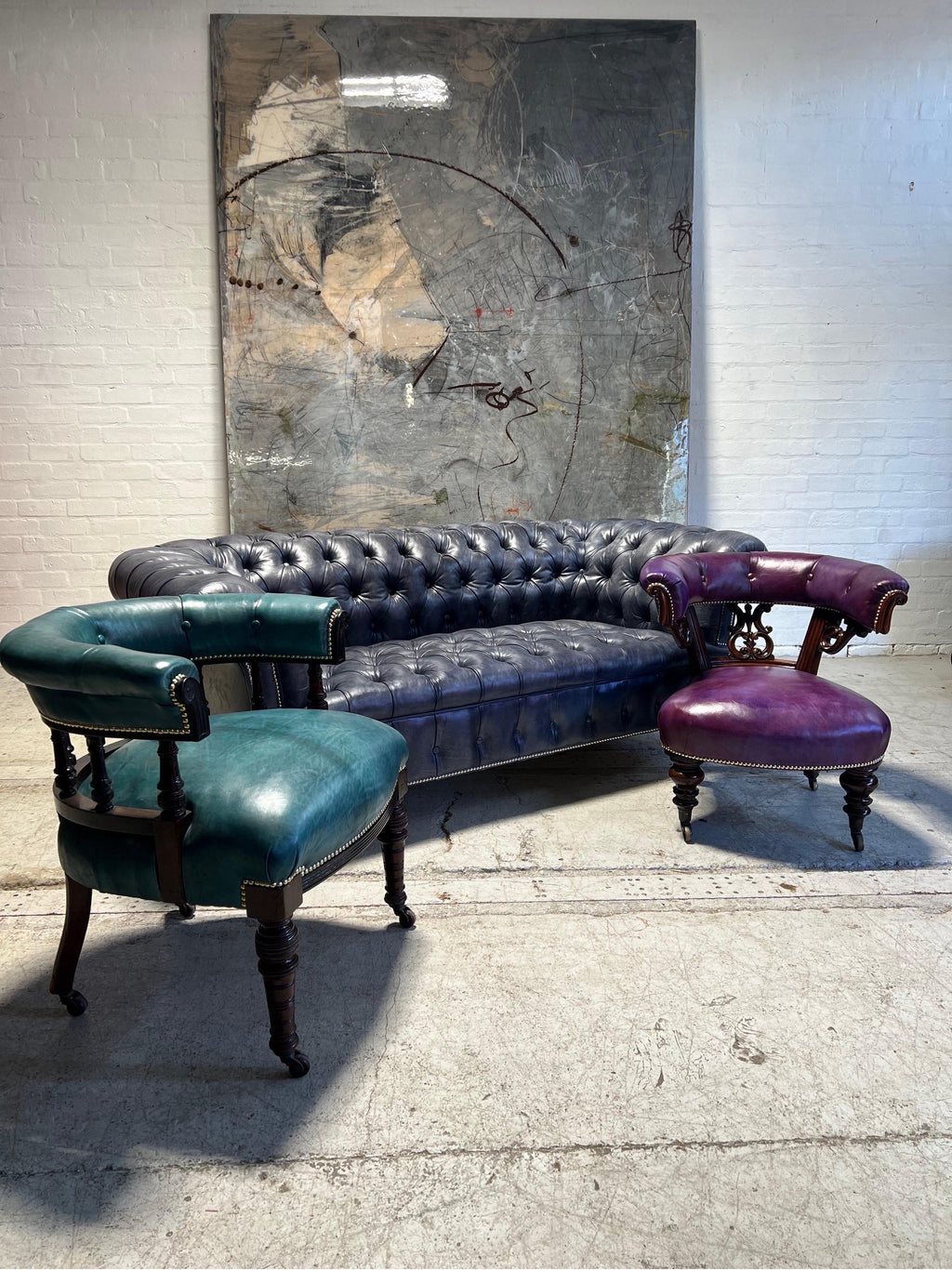 https://a.1stdibscdn.com/our-signature-howard-chesterfield-sofa-in-hand-dyed-elephant-grey-leather-for-sale-picture-9/f_79732/1677226981333/mobilejpegupload_26C45EC728F64F7FB1AD6232434F2D3D_master.jpg