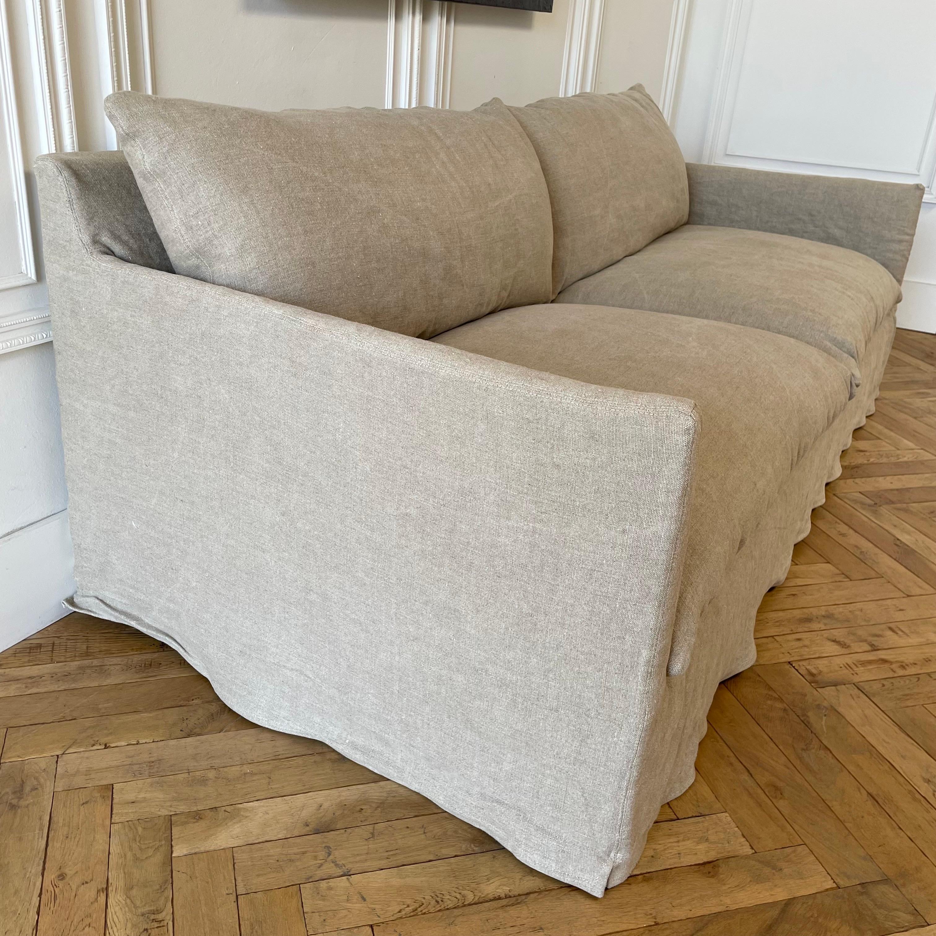 https://a.1stdibscdn.com/new-custom-stone-washed-irish-linen-slip-covered-sofa-with-down-alt-cushions-for-sale-picture-2/f_18223/1669674794479/mobilejpegupload_53D3061279164E13B9A98C8F296BBB5C_master.jpg