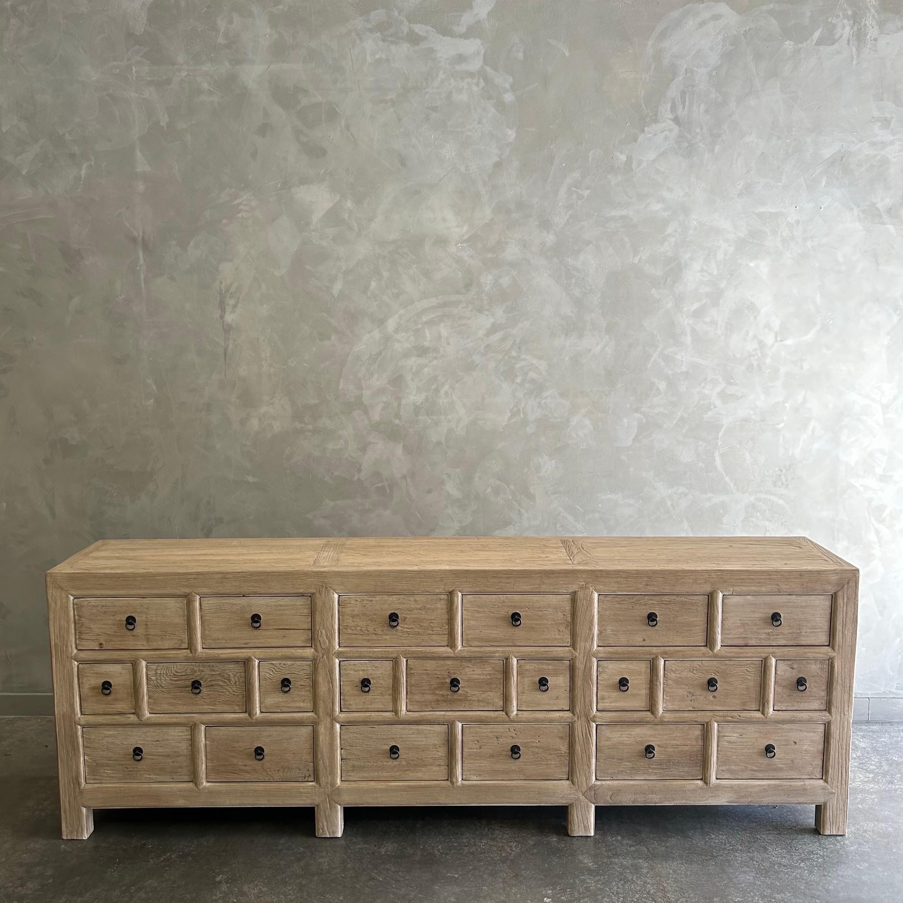 https://a.1stdibscdn.com/custom-made-elm-wood-apothecary-style-cabinet-in-natural-finish-for-sale-picture-4/f_18223/1702782055398/mobilejpegupload_53DE3A6F59DF42AAAE8429C80A16C567_master.jpg