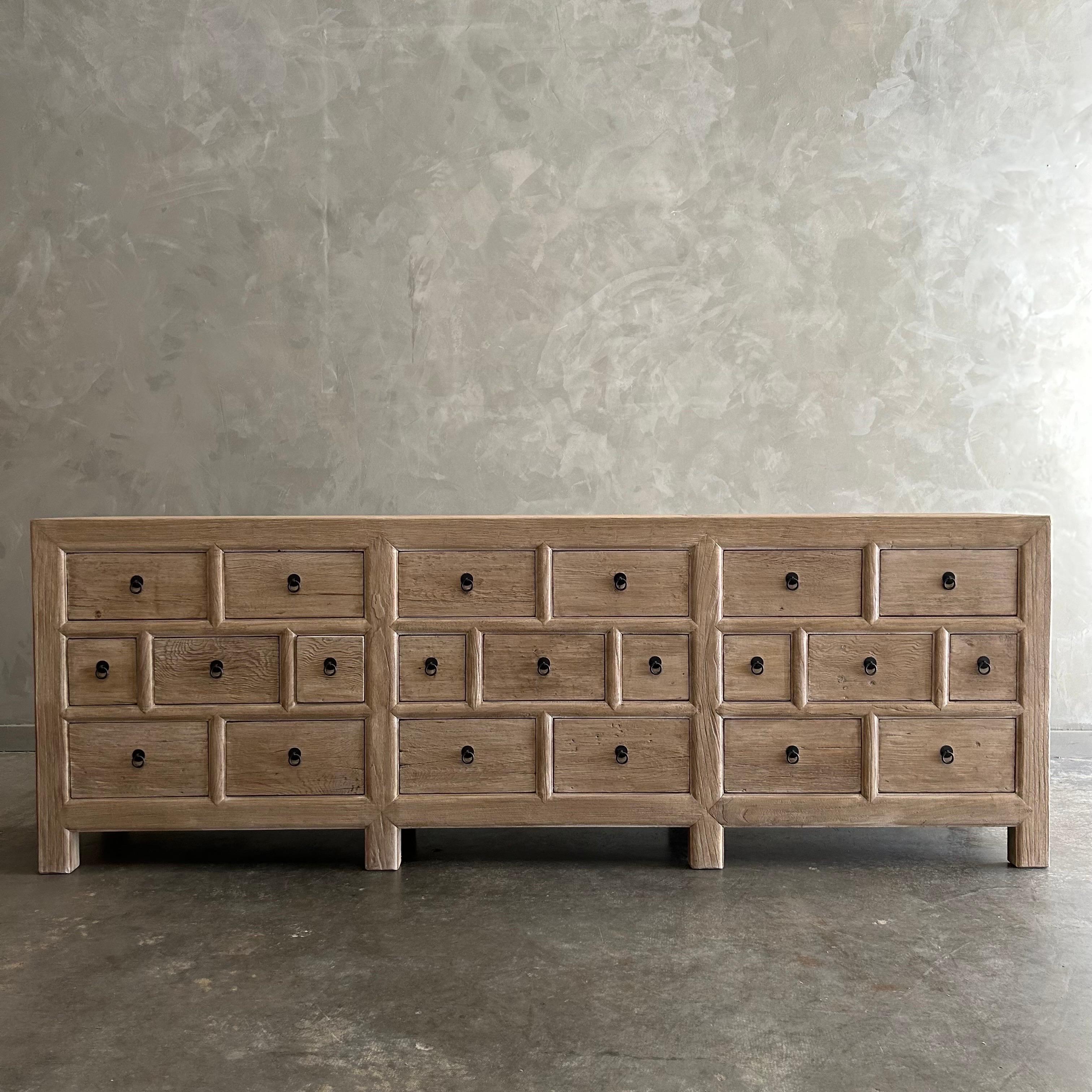 https://a.1stdibscdn.com/custom-made-elm-wood-apothecary-style-cabinet-in-natural-finish-for-sale-picture-2/f_18223/1702782123295/mobilejpegupload_652EC2A8C6C04337B5CE3D97181BA9C6_master.jpg