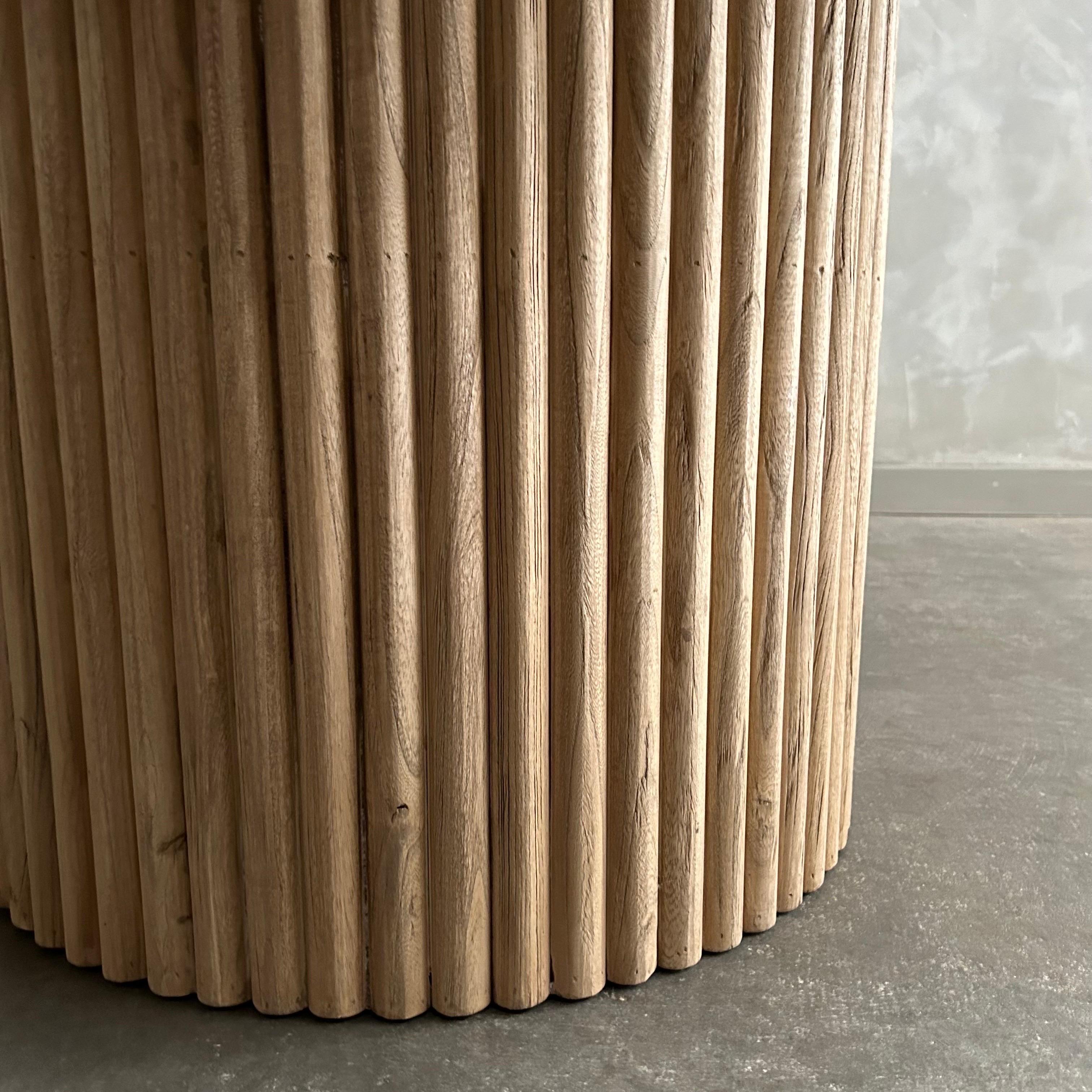 https://a.1stdibscdn.com/custom-made-fluted-base-round-dining-table-in-solid-elm-wood-for-sale-picture-5/f_18223/f_418589921728687424449/mobilejpegupload_6AF8986E2E894896B33A2EA9676428A6_master.jpg
