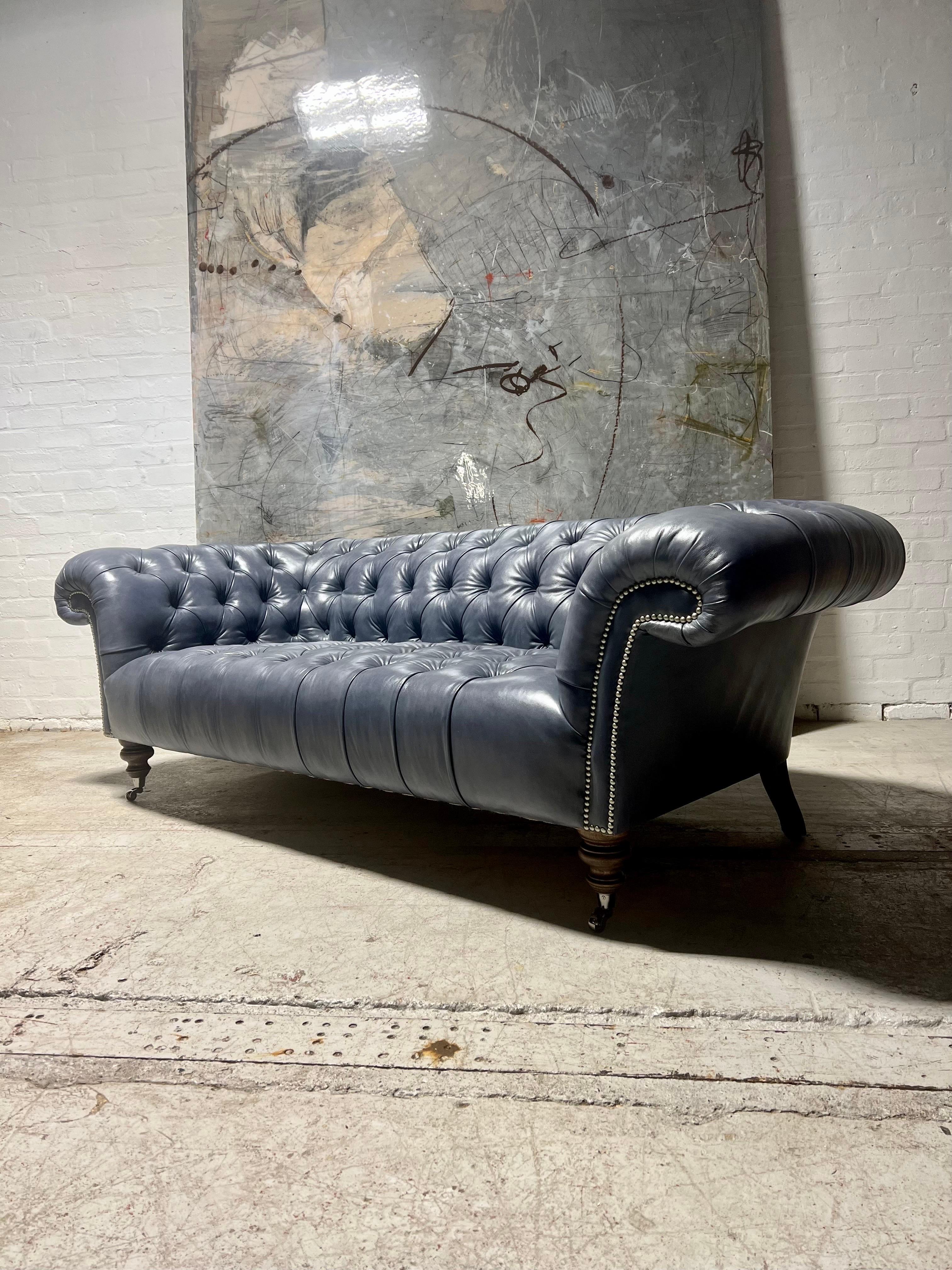 https://a.1stdibscdn.com/our-signature-carver-tufted-chesterfield-sofa-in-hand-dyed-elephant-grey-leather-for-sale-picture-3/f_79732/1699175571812/mobilejpegupload_738D6945C278424390112CC09FE4F25D_master.jpg