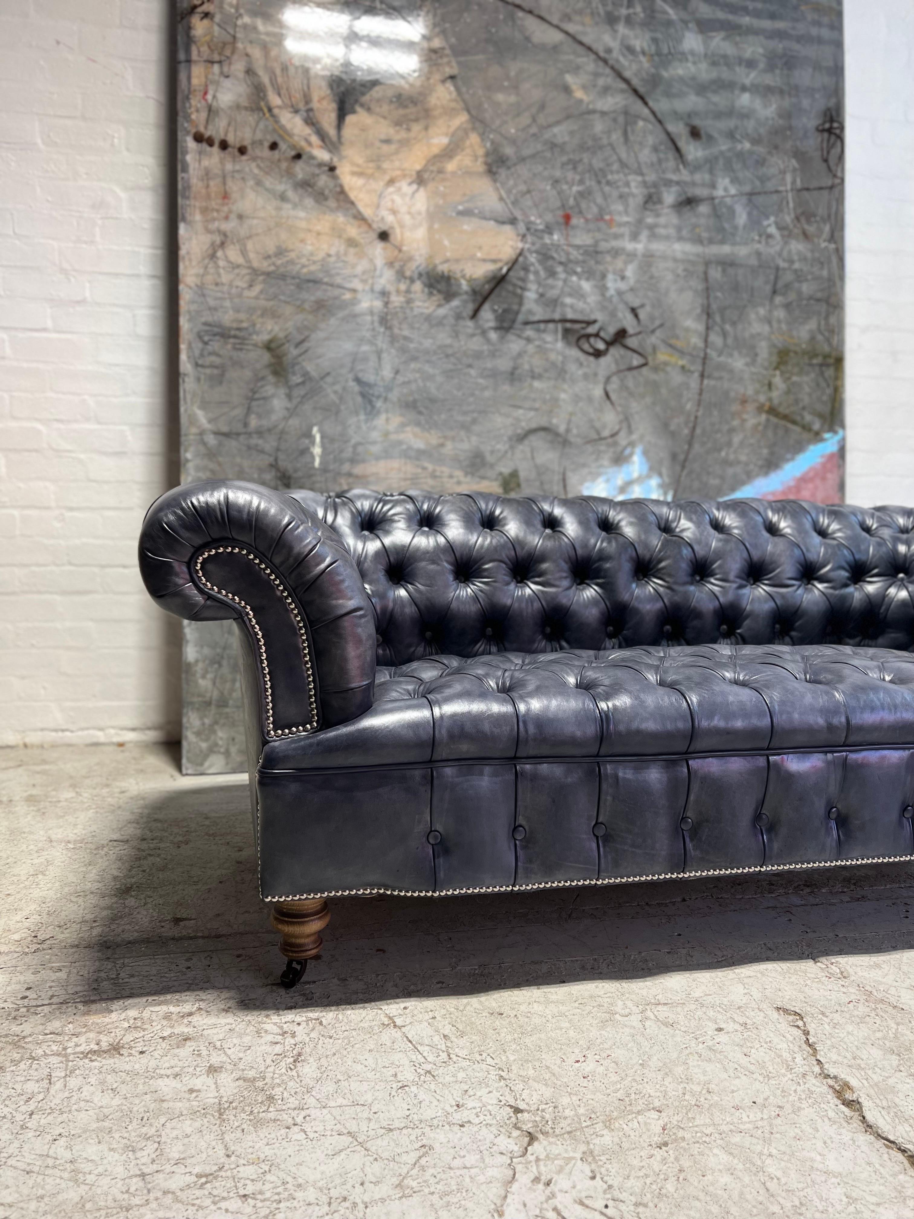 https://a.1stdibscdn.com/our-signature-howard-chesterfield-sofa-in-hand-dyed-elephant-grey-leather-for-sale-picture-4/f_79732/1677225858916/mobilejpegupload_7575962969124ADCAB41365F266A1C68_master.jpg