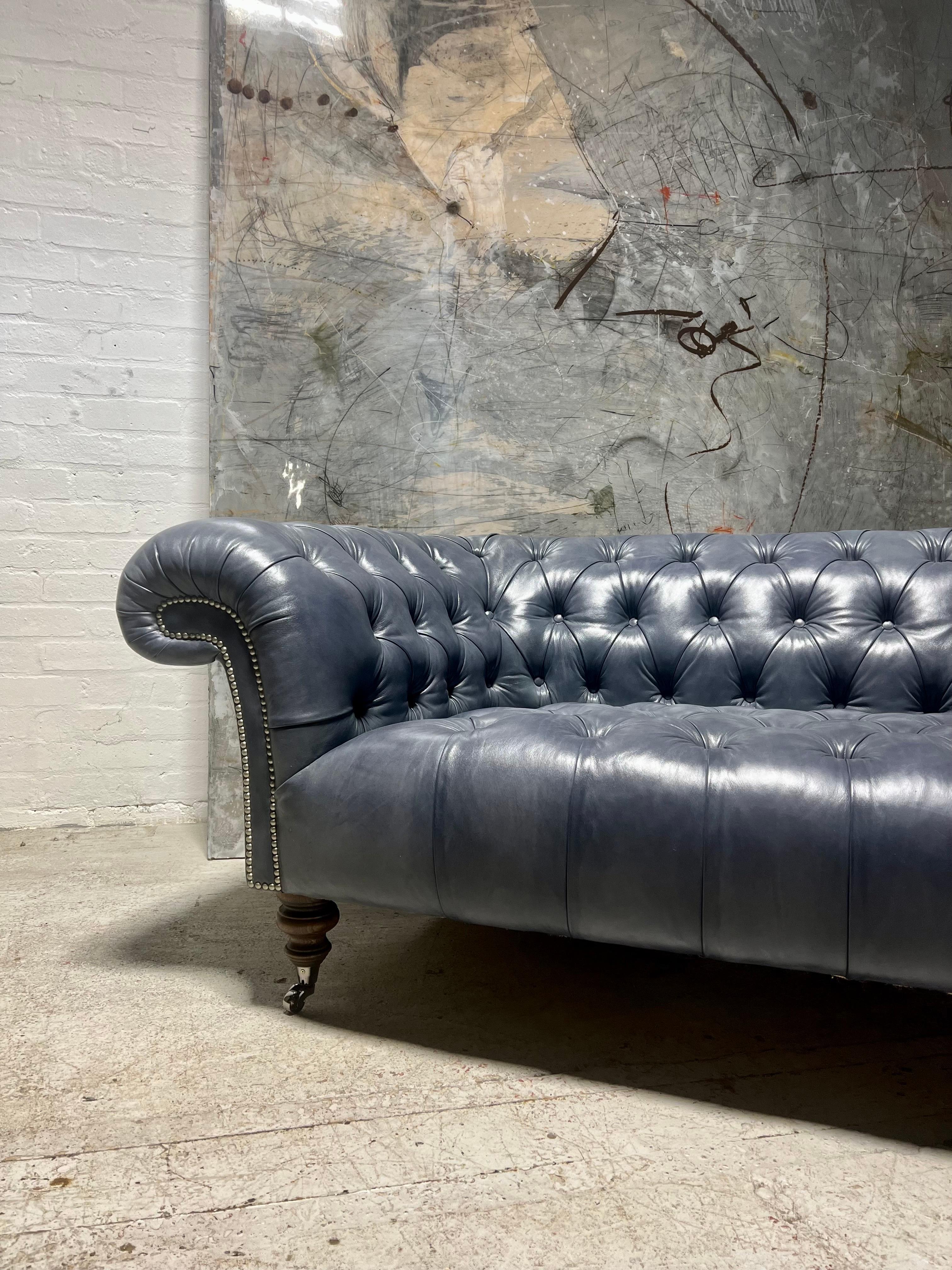 https://a.1stdibscdn.com/our-signature-carver-tufted-chesterfield-sofa-in-hand-dyed-elephant-grey-leather-for-sale-picture-5/f_79732/1699175568927/mobilejpegupload_A0356D6529234C1C9F6A6AC21B930603_master.jpg