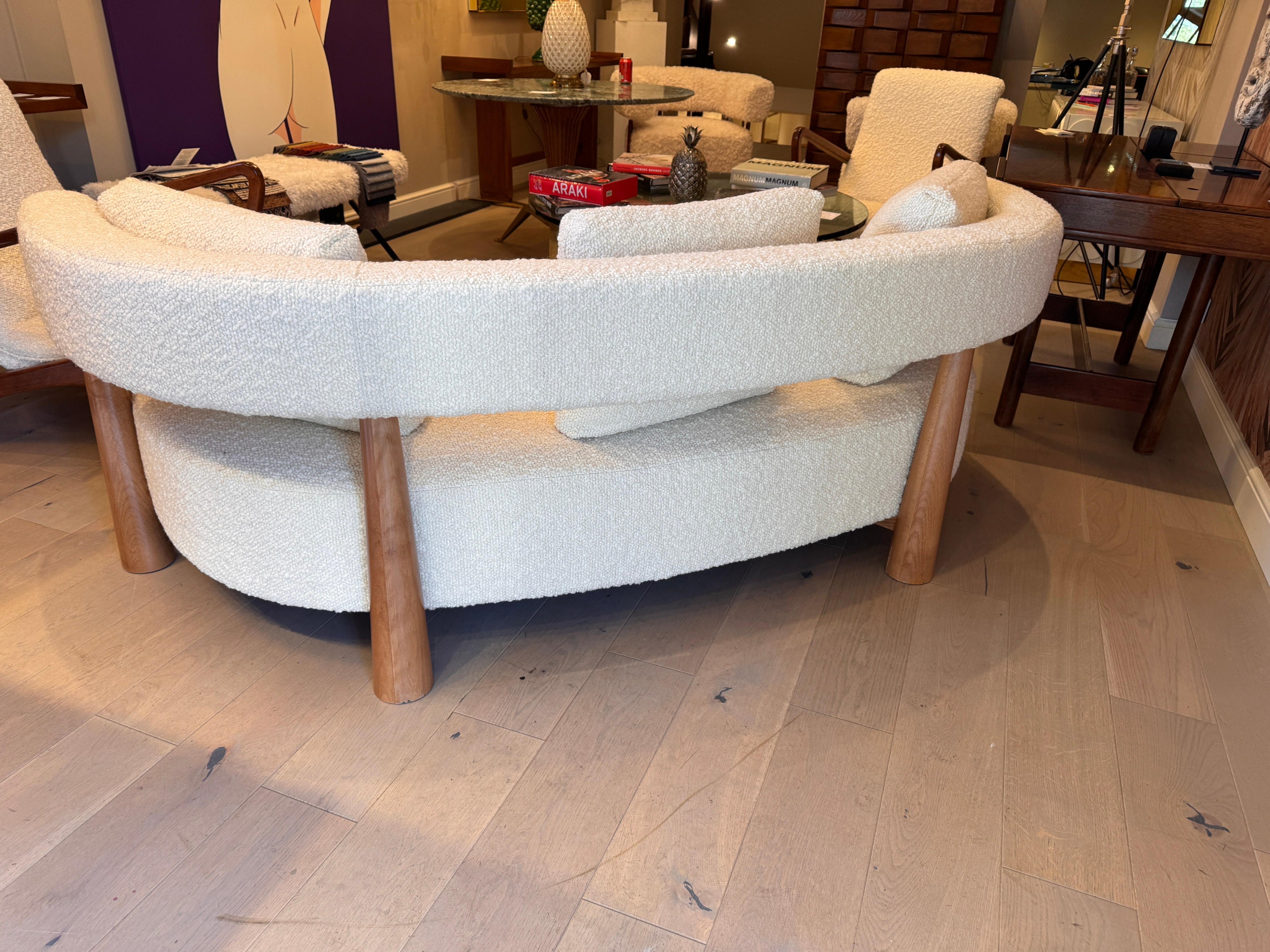 https://a.1stdibscdn.com/large-curved-kidney-shaped-sofa-in-lambswool-boucle-for-sale-picture-5/f_41851/1740411810835/mobilejpegupload_A334DC947B5E423482BB31E5410317EB_master.jpg