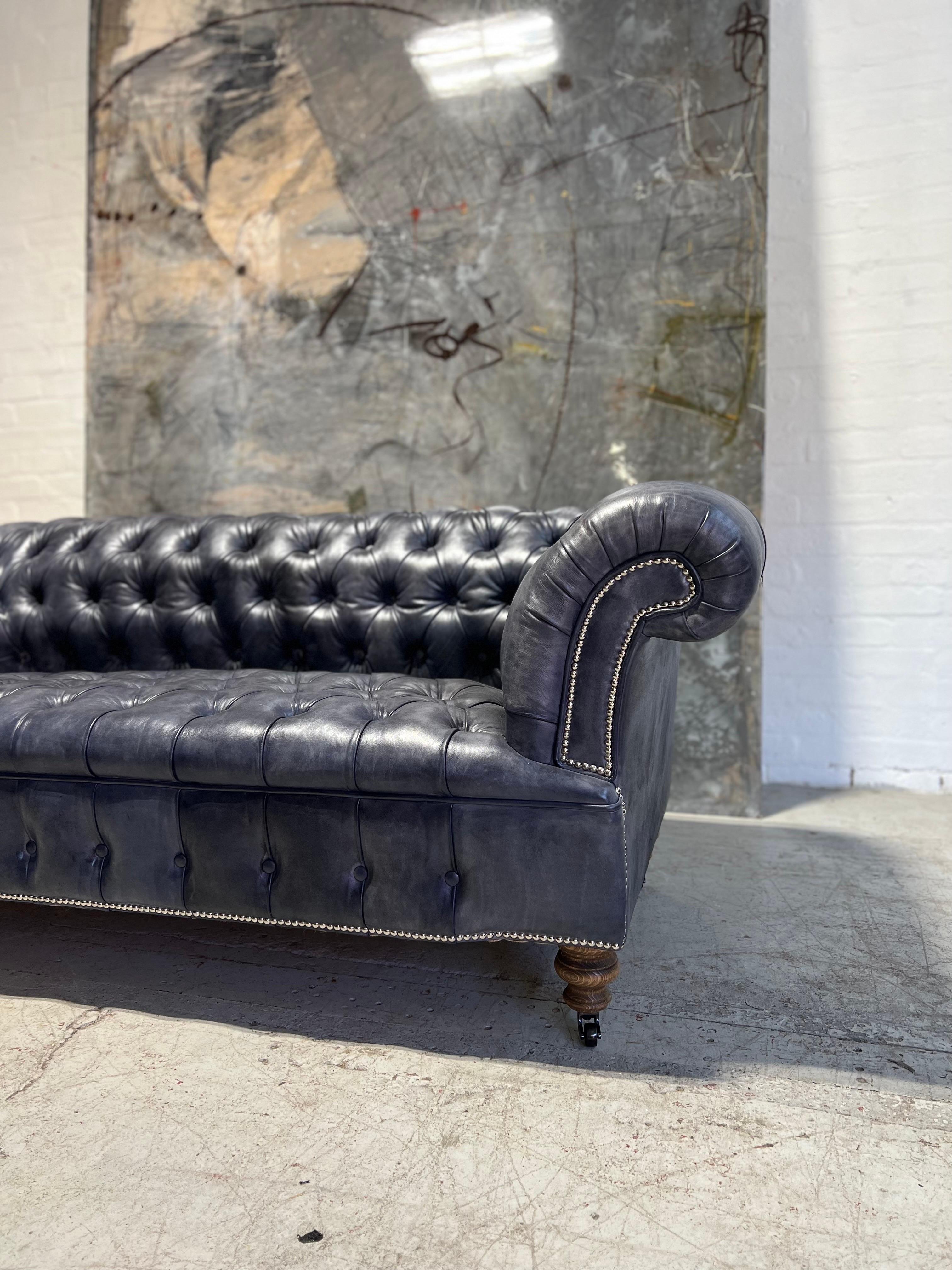 https://a.1stdibscdn.com/our-signature-howard-chesterfield-sofa-in-hand-dyed-elephant-grey-leather-for-sale-picture-6/f_79732/1677225863867/mobilejpegupload_A5F2D16F4A1642468BB98682C7D9C7DF_master.jpg