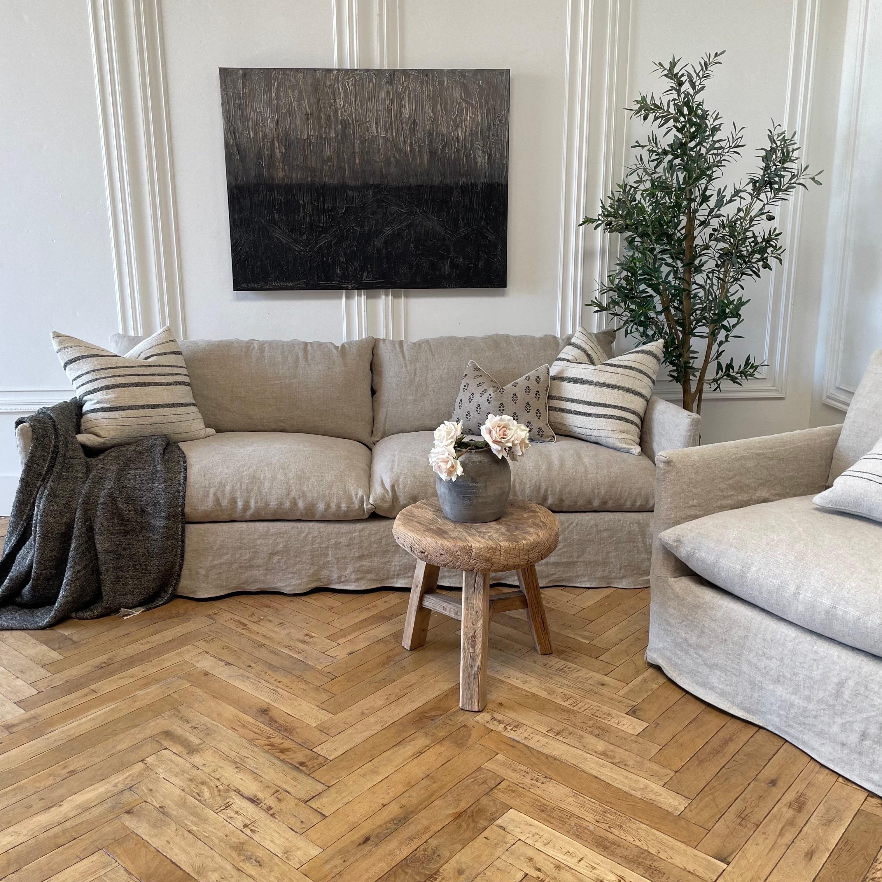https://a.1stdibscdn.com/new-custom-stone-washed-irish-linen-slip-covered-sofa-with-down-alt-cushions-for-sale-picture-18/f_18223/1669674819477/mobilejpegupload_B2217049FC4C480CB23BBD7867436B0B_master.jpg