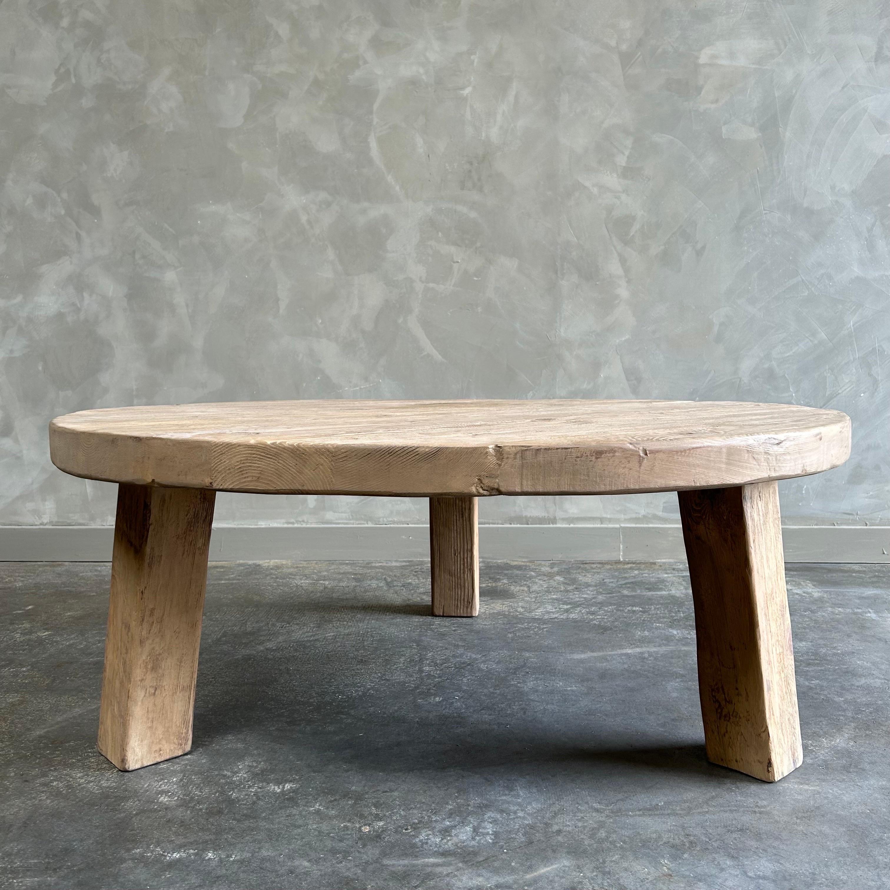 https://a.1stdibscdn.com/solid-round-reclaimed-elm-wood-2-piece-nesting-coffee-table-set-for-sale-picture-8/f_18223/1686799795531/mobilejpegupload_B87D873CB1E7478F9DBE103312D75BE1_master.jpg