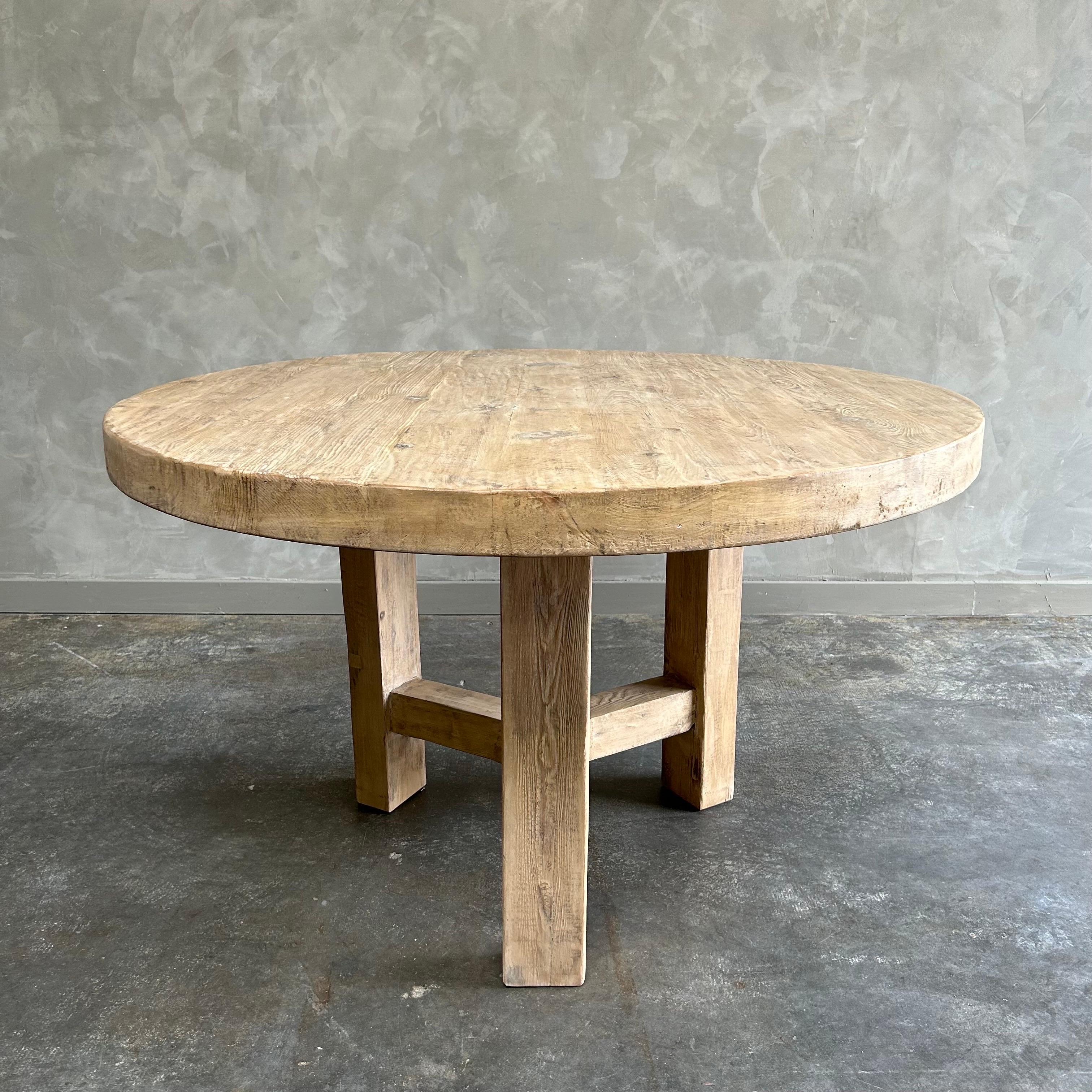 https://a.1stdibscdn.com/custom-made-42-round-elm-wood-dining-table-for-sale-picture-5/f_18223/f_469020021759434831198/mobilejpegupload_CB09AAA93D8C48E9B893246D36DDE184_master.jpg